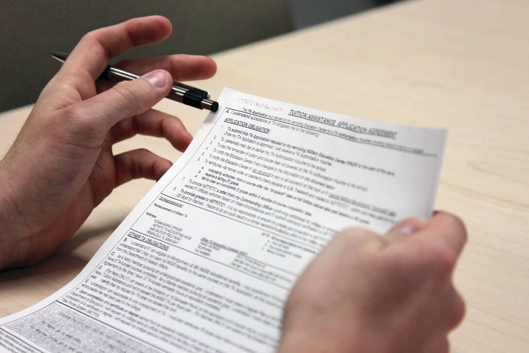 Tuition Assistance forms are available at Building 411 and require the signature of an E-7 or above. Once the paper has been signed and turned in students are given a certificate to turn in to their college.