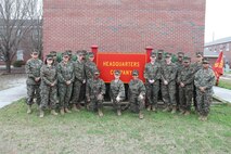 Female Marines with Combat Logistics Regiment 27, 2nd Marine Logistics Group pose in front of the Headquarters Company office aboard Camp Lejeune, N.C., Jan. 15, 2013. They gathered here in honor of retired Brig. Gen. Margaret A. Brewer, the first female general officer in the Marine Corps, who recently passed away. (U.S. Marine Corps photo by Sgt. Rachael K. A. Moore)