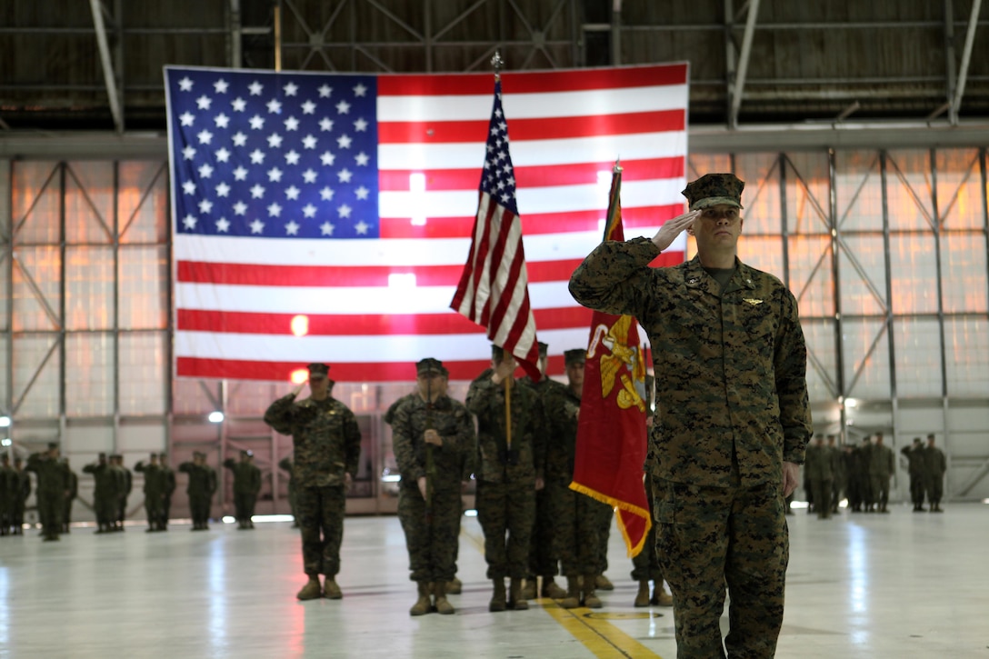 Helicopter pilot Lt. Col. Scott A. Craig, commanding officer of Marine Medium Helicopter Squadron 764 (HMM-764), renders a final salute during a change of command ceremony at Edwards Air Force Base near Lancaster, Calif., Jan. 12, 2013. Craig relinquished command to Osprey pilot Lt. Col. David A. Weinstein before HMM-764 was re-designated to Marine Medium Tiltrotor Squadron (VMM-764). (U.S. Marine Corps photo by Sgt. Ray Lewis/Released)