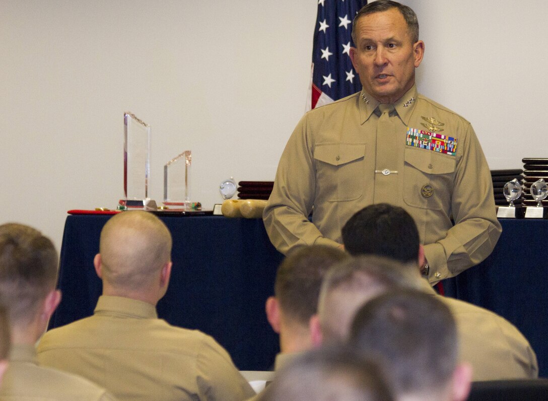 Lieutenant Gen. Robert E. Milstead, Jr., commanding general, Marine Corps Recruiting Command, addresses officer selection officers from across the nation, just before presenting awards to MCRC’s most successful OSOs, during the 2013 National Officer Selection Officers’ Conference here Jan. 14. General Milstead stressed the importance of attracting the most qualified individuals for the opportunity to lead Marines.