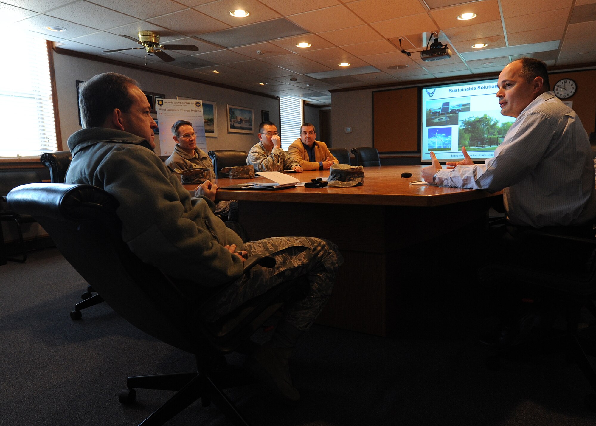 Rex Bluml, 22nd Civil Engineer Squadron chief asset manager, discusses energy sustainability efforts with Maj. Gen. Timothy Byers, the U. S. Air Force Civil Engineer, Jan. 8. 2013, McConnell Air Force Base, Kan. Byers, team lead for the 2013 Commander in Chief’s Installation Excellence Award assessment team, visited several groups and squadrons as part of the two-day assessment of McConnell. (U.S. Air Force photo/Senior Airman Katrina M. Brisbin)
