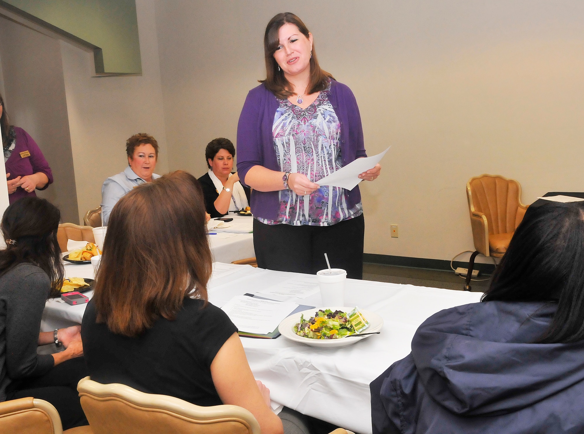 Lesley Darley, Community Support Coordinator, briefs members of the Parents Advocates for Students and Schools about the new CSC position during a working lunch Wednesday.  (U. S. Air Force photo/Sue Sapp)