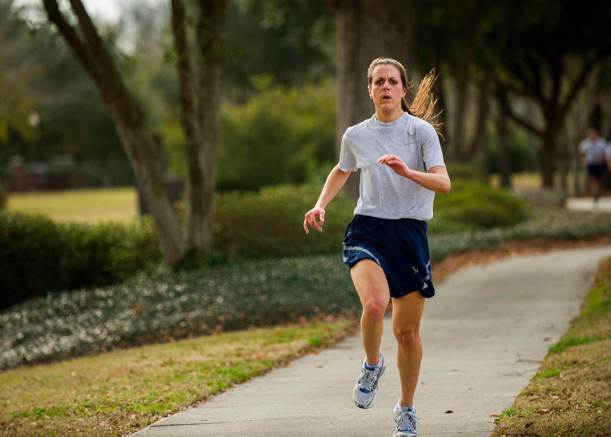 Capt. Sarah Hadacek, 628th Air Base Wing Judge Advocate office chief of legal assistance, approaches the finish line during the Martin Luther King Jr. Day 5k Run Jan. 11, 2013, at Joint Base Charleston, S.C. Hadacek finished as the top female participant with a time of 23:24. The 5k was a tribute to Martin Luther King Jr., and served as a reminder of his accomplishments and sacrifices. (U.S. Air Force photo/Senior Airman George Goslin)