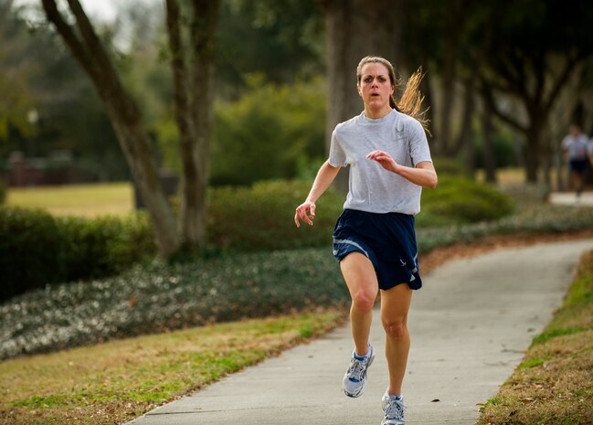 Capt. Sarah Hadacek, 628th Air Base Wing Judge Advocate office chief of legal assistance, approaches the finish line during the Martin Luther King Jr. Day 5k Run Jan. 11, 2013, at Joint Base Charleston, S.C. Hadacek finished as the top female participant with a time of 23:24. The 5k was a tribute to Martin Luther King Jr., and served as a reminder of his accomplishments and sacrifices. (U.S. Air Force photo/Senior Airman George Goslin)