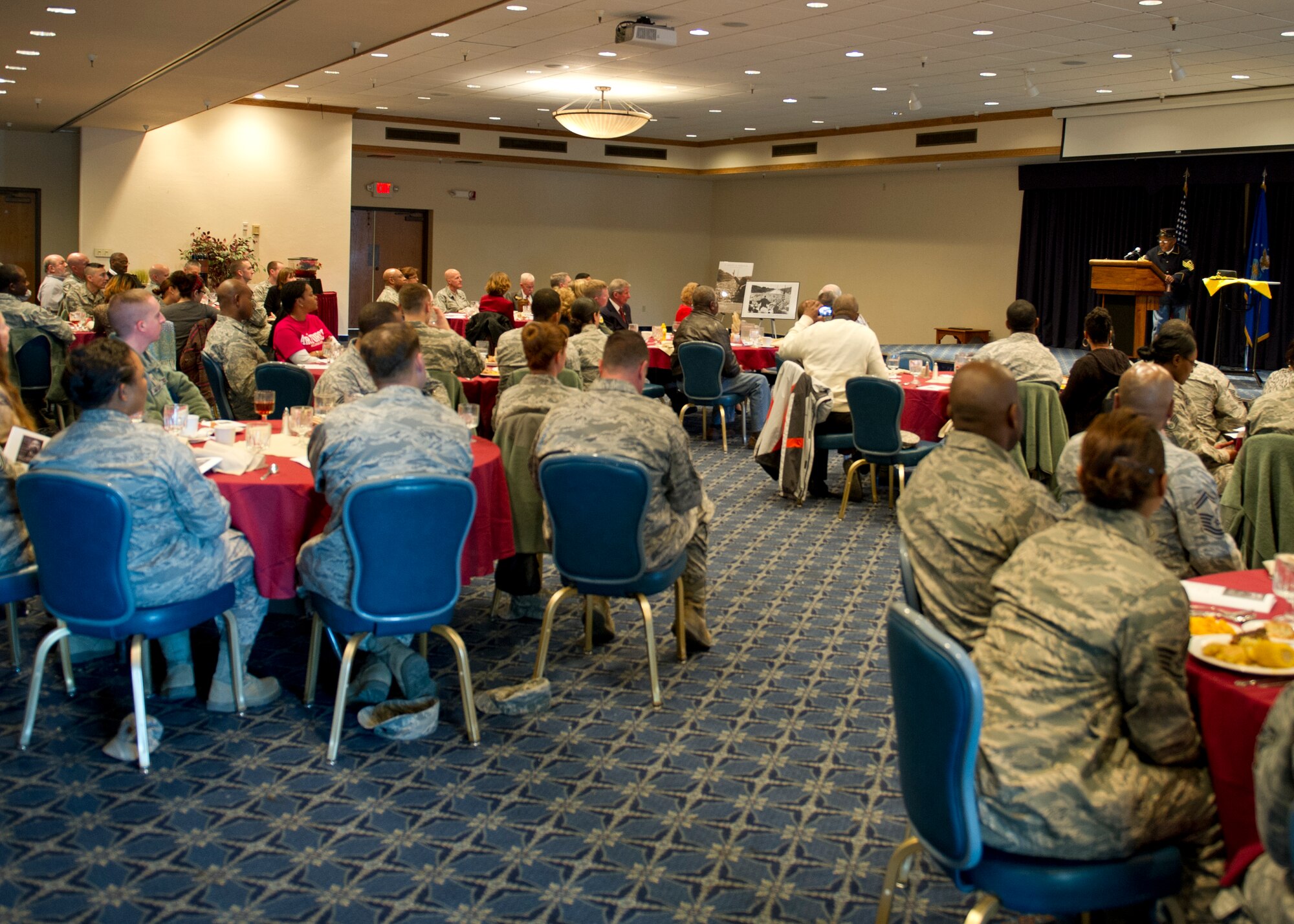 Retired Army Command Sgt. Maj. Charles Taylor Jr., Buffalo Soldier reenactor, El Paso, Texas, speaks at the Dr. Martin Luther King Jr. Remembrance Day Luncheon at Holloman Air Force Base, N.M., Jan. 15. The luncheon showcased Dr. King’s life through a slide-show presentation and posters. (U.S. Air Force photo by Senior Airman Kasey Close/Released)