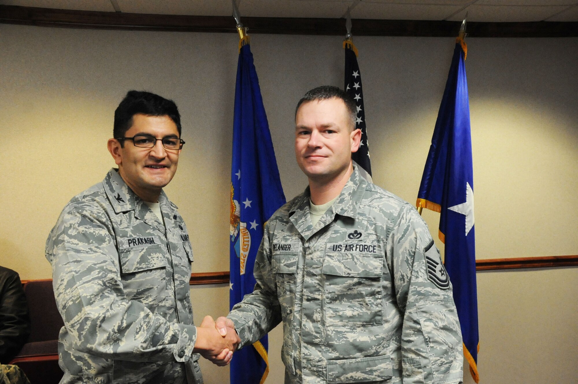 Col. Om Prakash (left), 82nd Training Wing vice-commander, congratulates Master Sgt. David Balanger, 364th Training Squadron Field Training Detachment 1, Fort Leonard Wood, Mo., for being named the Air Force's 2012 Daniel's Award winner.  The award is given to the best civil engineering operations flight superintendent. (U.S. Air Force photo/Dan Hawkins)