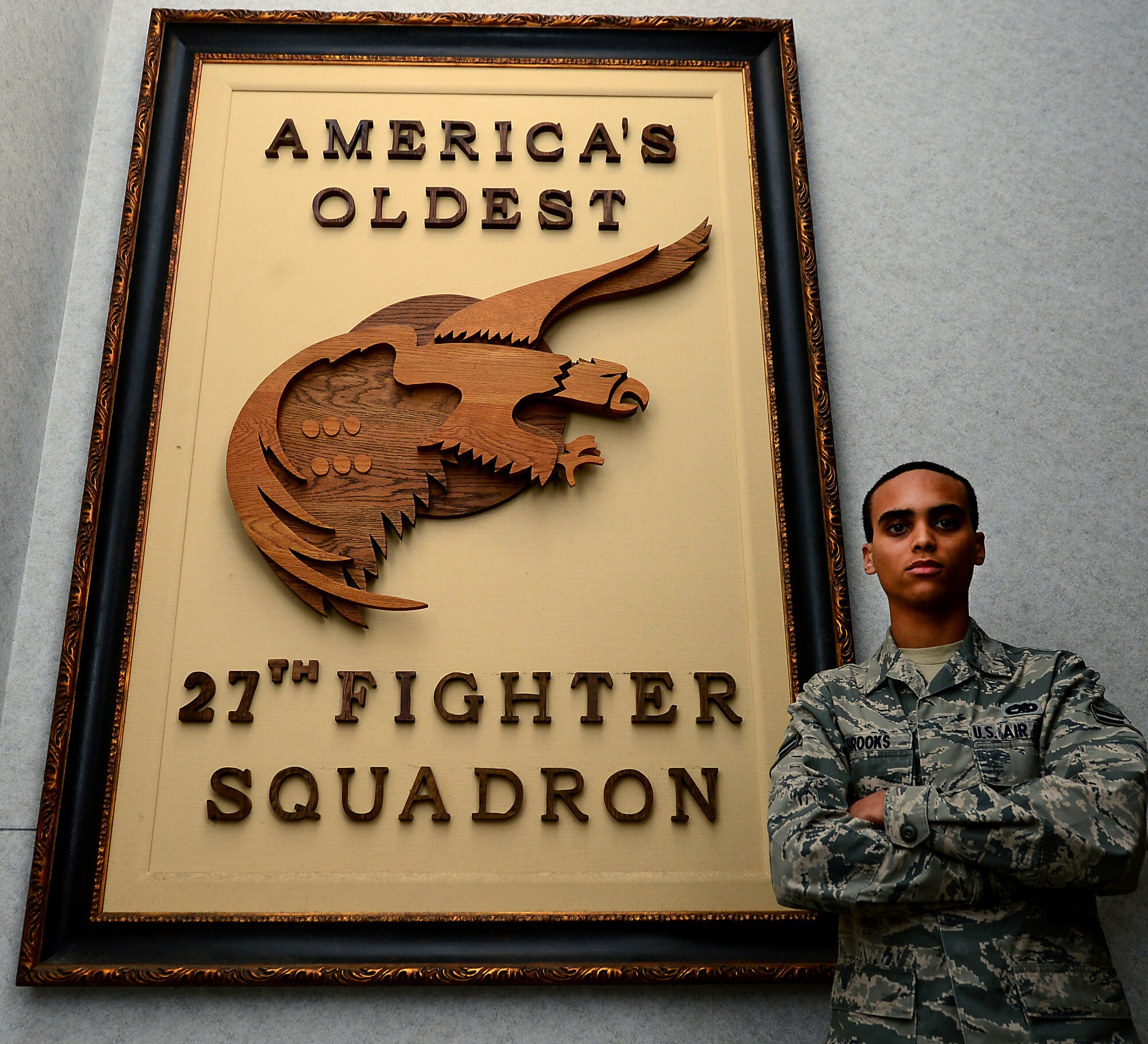 U.S. Airman 1st Class Gabriel Brooks, 27th Air Maintenance Unit avionics specialist, is a third-generation Airman; following behind his father and grandfather. Brooks’ father, Anthony, was stationed at Langley Air Force Base, Va., with the 27th AMU in 1982.  (U.S. Air Force photo by Senior Airman Kayla Newman/Released)