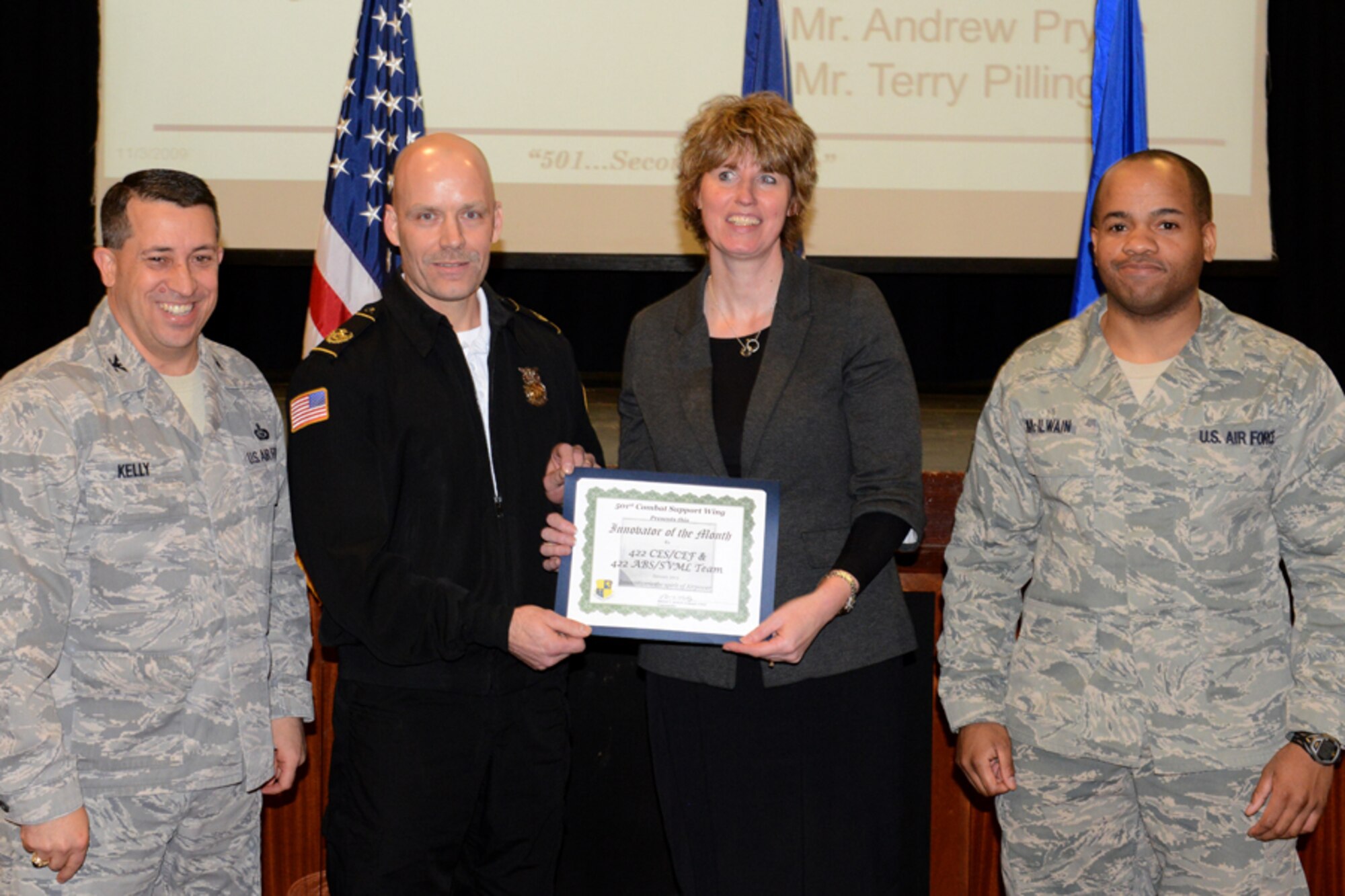 RAF CROUGHTON, United Kingdom - The 422nd Civil Engineer Squadron Fire Department and 422nd Air Base Squadron Lodging Office were recently named the 501st Combat Support Wing’s Innovator of the Month for December. After the 422nd ABS Lodging Office was notified of a pending demolition of contingency dorms at RAF Fairford, they constructed a plan to salvage the existing card key locks as they are the same type in use at RAF Croughton. There is not a locksmith at RAF Fairford so the 422nd CES fire department assisted with cutting the locks out of the doors. The teamwork between the 422nd ABS and 422nd CES helped foster a collaborative work environment and built rapport between the units, while diverting material from the solid waste stream--capturing the intent of the reduce, reuse and recycle program. (U.S. Air Force photo by Tech. Sgt. Chrissy Best)
