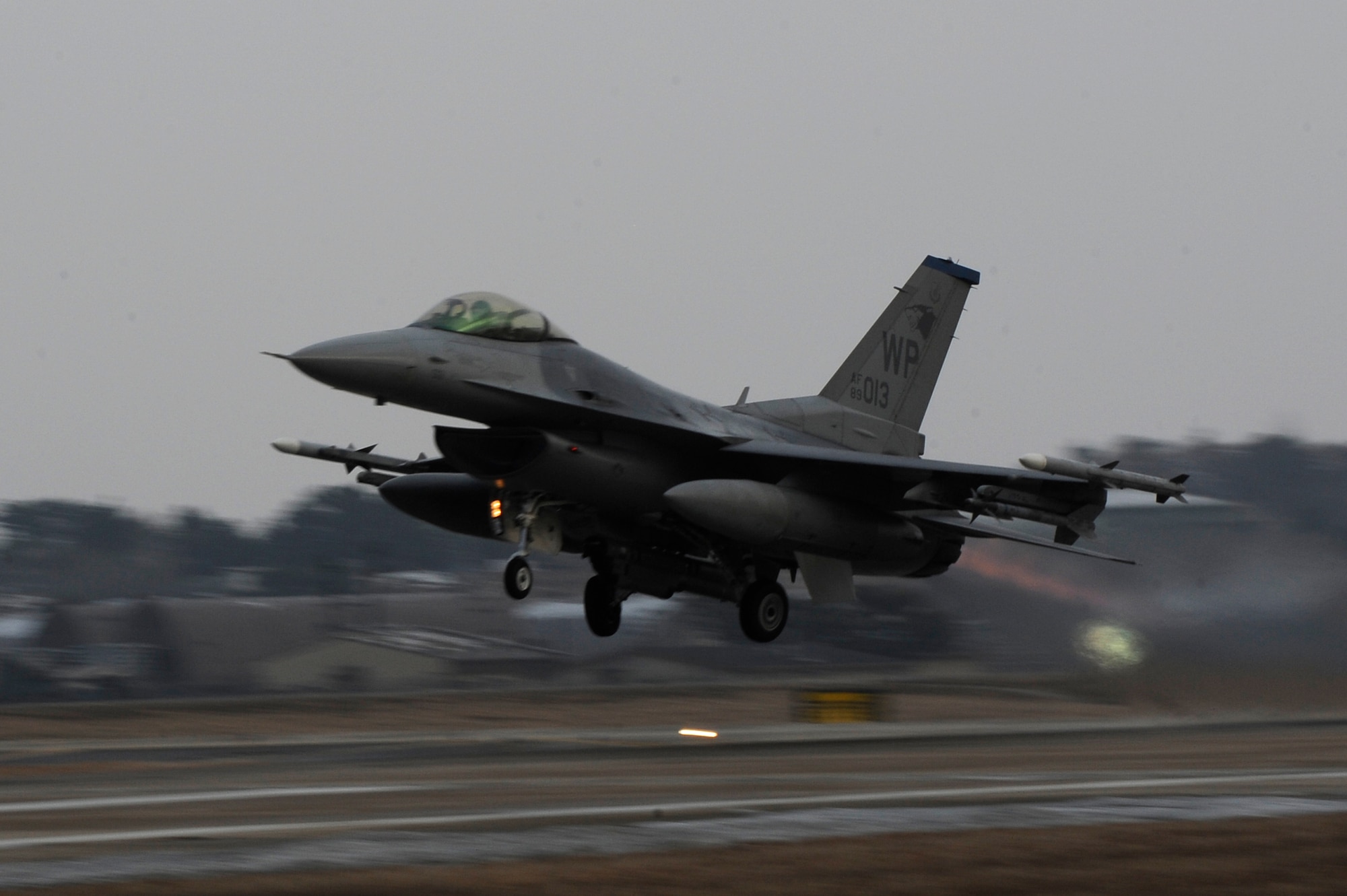 An F-16 Fighting Falcon with the 8th Fighter Wing takes off during Exercise Beverly Midnight 13-1 at Kunsan Air Base, Republic of Korea, Jan. 16, 2013.This was part of the first set of flights for BM 13-1 and tests the capabilities of ground and air crew during a wartime scenario. (U.S. Air Force photo by Senior Airman Marcus Morris/Released)