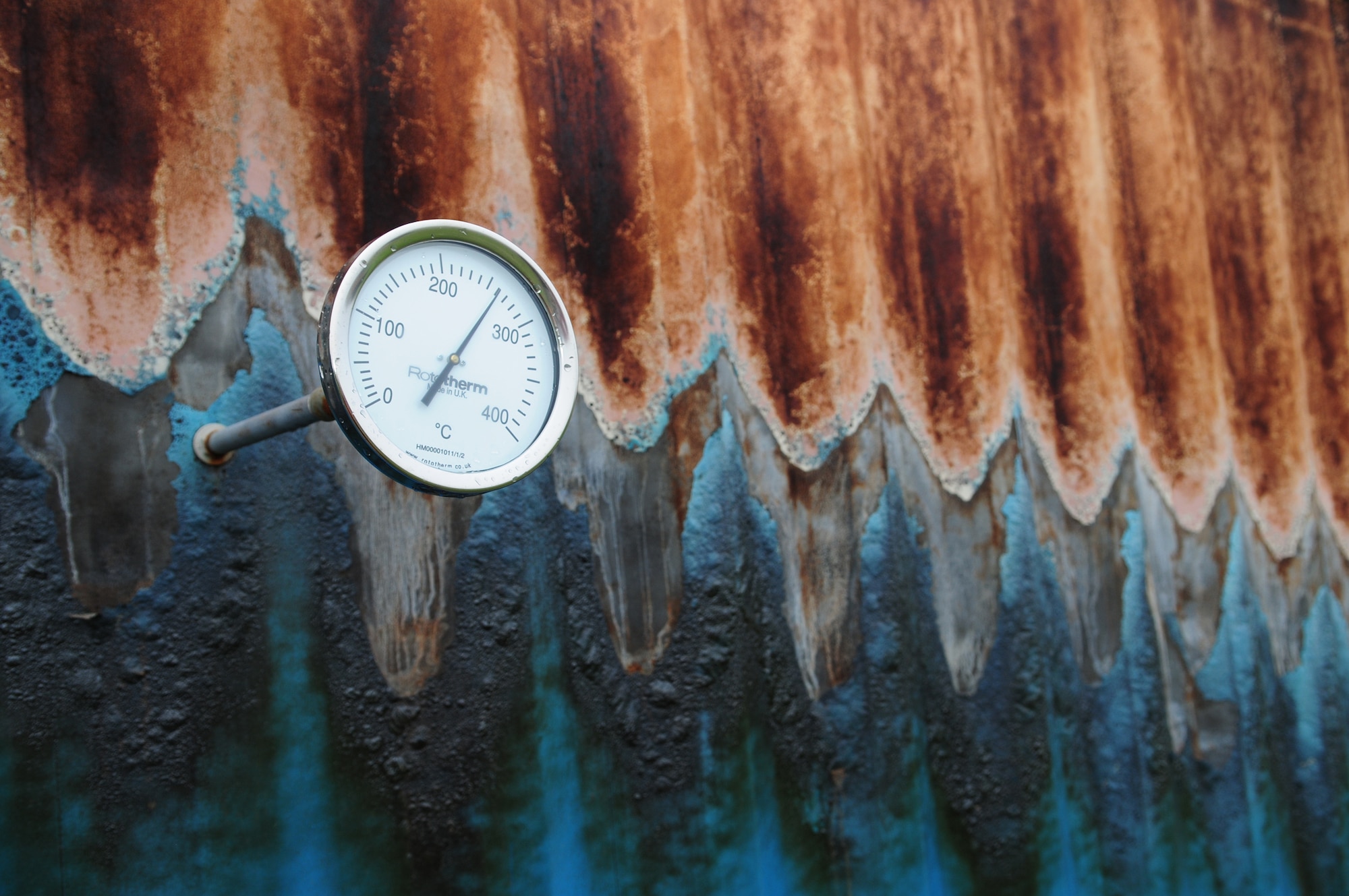 A thermometer shows the temperature in degrees Celsius, inside the compartment fire behavior trainer Jan. 10, 2013, at RAF Mildenhall, England. The trainer, a converted shipping container, cost approximately $27,000. It is used to demonstrate how compartment fires develop and allows firefighters to identify conditions that create flashovers and backdrafts so they can safely attack the fire. (U.S. Air Force photo by Karen Abeyasekere/Released)