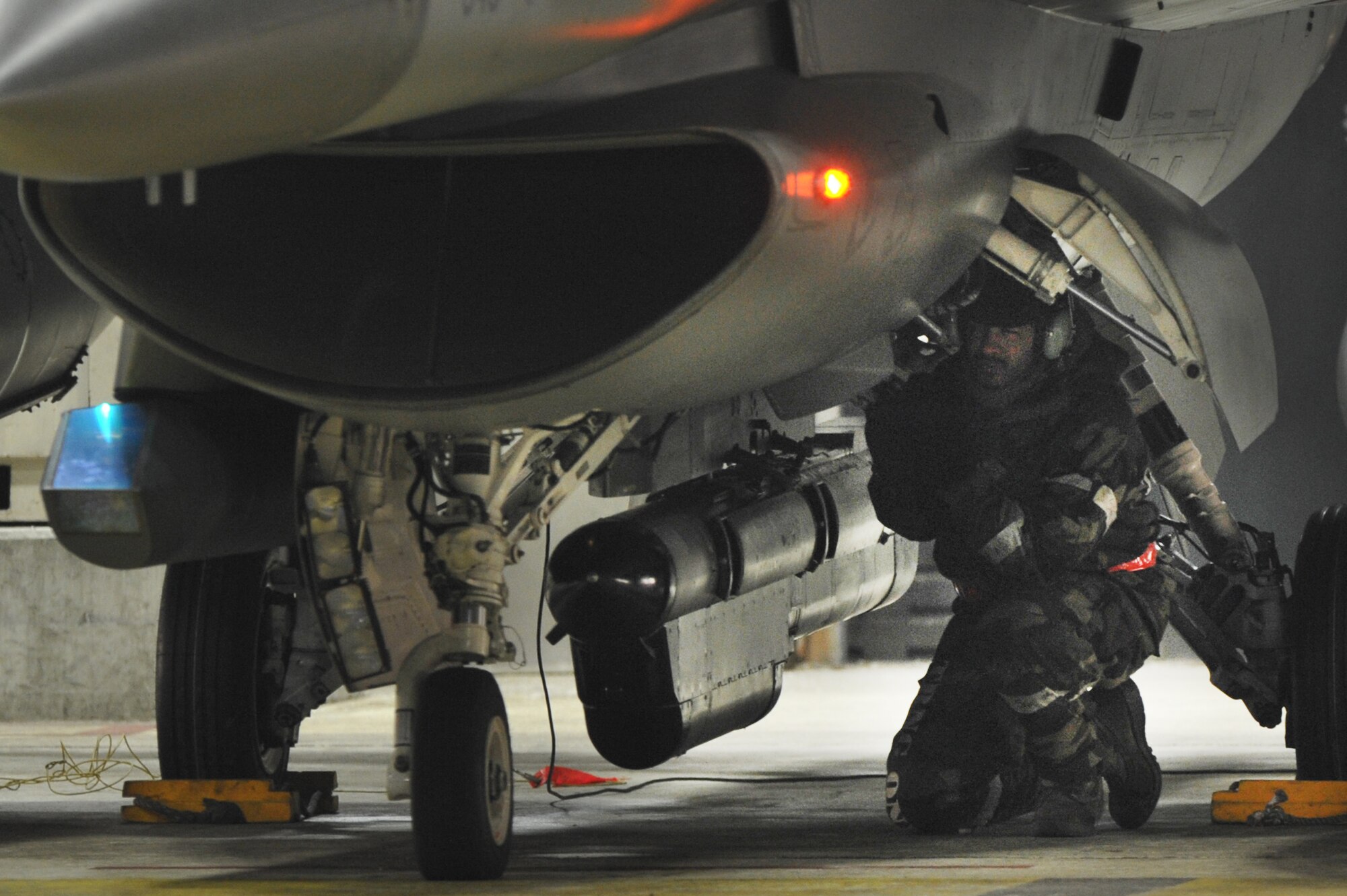 Senior Airman Keith Rice, Jr., 36th Aircraft Maintenance Unit engines technician, runs through a pre-flight checklist for the F-16 on the flight line at Osan Air Base, Republic of Korea, Jan. 15 2013. Rice ensured the F-16 was ready to go for the first sortie flight for operational readiness exercise Beverley Midnight 13-01 which tested Osan Airmen’s to perform their abilities during a heightened state of readiness while providing combat ready forces for close air support, air strike control, counter air, interdiction, theater airlift, and communications in the defense of the Republic of Korea.(U.S. Air Force photo/Staff Sgt. Emerson Nunez)