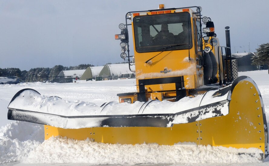 U.S. Air Force Col. Stephen Williams, 35th Fighter Wing commander, clears the flightline of fresh, powder snow during the Command Chief’s dirty jobs program at Misawa Air Base, Japan, Jan. 15, 2013. The program is engineered to allow Airmen a chance to showcase their daily lives on the job to leadership. (U.S. Air Force photo by Airman 1st Class Kenna Jackson)