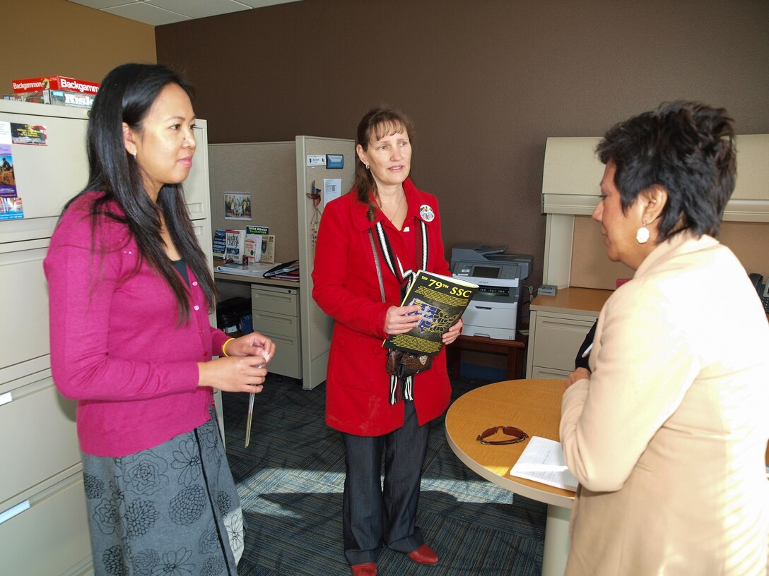 Jennie Ayala (right), the Los Angeles District outreach coordinator, speaks with Ann Nacino (left), 79th Sustainment Support Command Youth Services specialist and Sherry Rallis, 79th SSC Family Readiness community outreach assistant, during a tour of the new 53,000 square-foot headquarters facility at Joint Forces Training Base Los Alamitos, Calif., Jan. 12. They spoke about future collaboration on youth events and their facilities expanded capability. Rallis described the building as a beacon for the community, attracting family members of all services at JFTB.