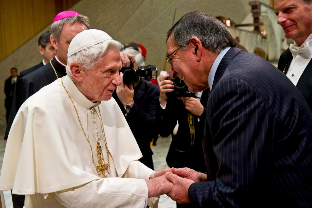 U.S. Defense Secretary Leon E. Panetta, right, speaks briefly with Pope Benedict XVI during his weekly general audience at the Vatican in Vatican City, Jan. 16, 2013. The pontiff thanked Panetta for helping to protect the world. 