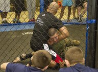 Marines teamed up with MMA instructors to give poolees from Recruiting Substation North Milwaukee a martial arts demonstration at Team Knockout MMA & Fitness gym here Jan. 12.  For more photos, visit: http://www.facebook.com/rsmilwaukee.
