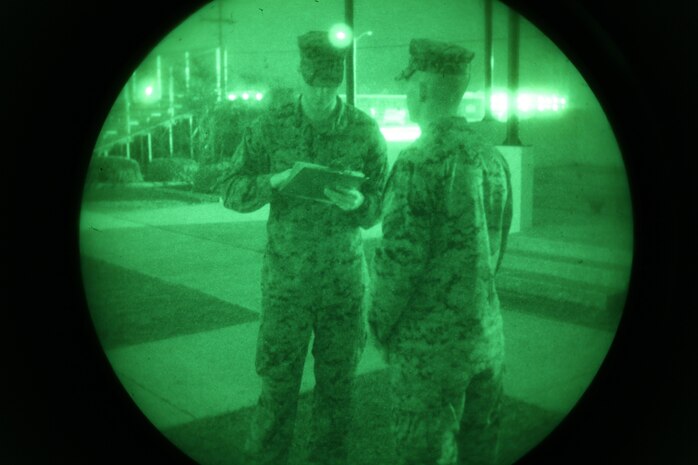 Second Lt. Tyler A. Mach, a Lincoln, Neb., native, and assistant logistics officer with Combat Logistics Battalion 6, 2nd Marine Logistics Group, asks a Marine a question during an exercise aboard Camp Lejeune, N.C., Jan. 15, 2013. Troops selected one Marine to complete a mental challenge while the rest of the team performed physical exercises such as mountain climbers, push-ups and squats at various stations set up for the event. 