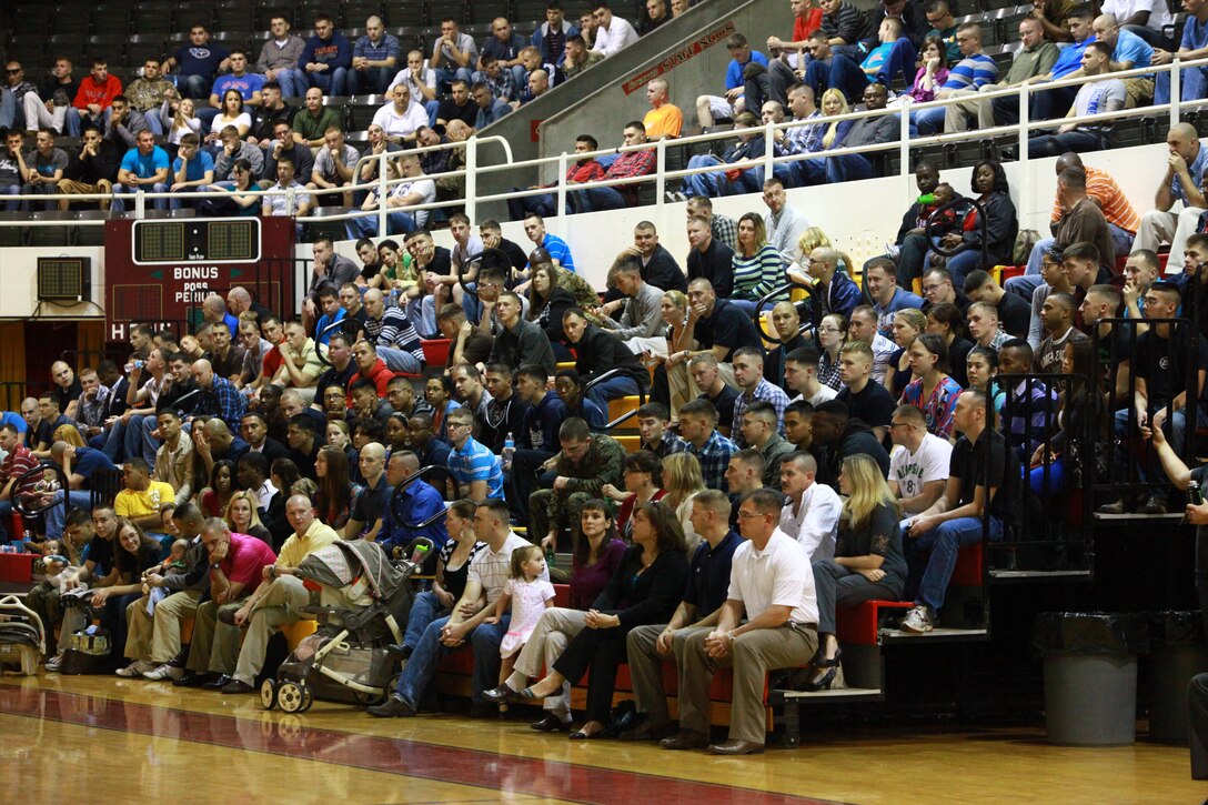 Marines and sailors with 2nd Maintenance Battalion, Combat Logistics Regiment 25, 2nd Marine Logistics Group sit with their families at an informational meeting held by their command at the Goettge Memorial Field House aboard Camp Lejeune, N.C., Jan. 14, 2013. The servicemembers and their families learned the unit’s training and event schedule for the year.