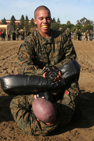 Recruits of Company C practice Marine Corps Martial Arts Program Techniques during the Combat Conditionaing Exercise, Jan.9.