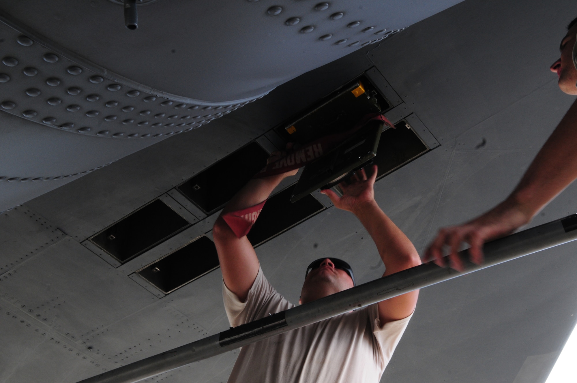 A crew chief from the 36th Maintenance Squadron prepares a B-52 Stratofortress during Operational Readiness Exercise Beverly Palm 13-01 at Andersen Air Force Base, Guam, Jan. 13, 2013. During Beverly Palm 13-01, executed from Jan. 13-16, Andersen Airmen practiced their ability to react, defend and execute operations in a wartime scenario. (U.S. Air Force photo by Senior Airman Robert Hicks/Released)