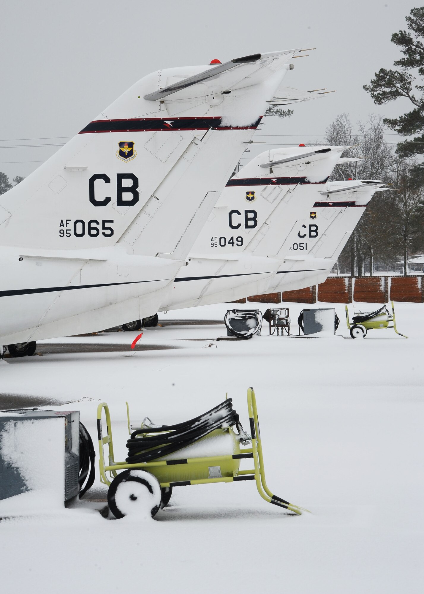 Columbus Air Force Base T-1A Jayhawks rest on the flightline Jan. 17 due to hazardous road conditions causing delayed reporting. Weather improved and flying operations resumed that same afternoon.