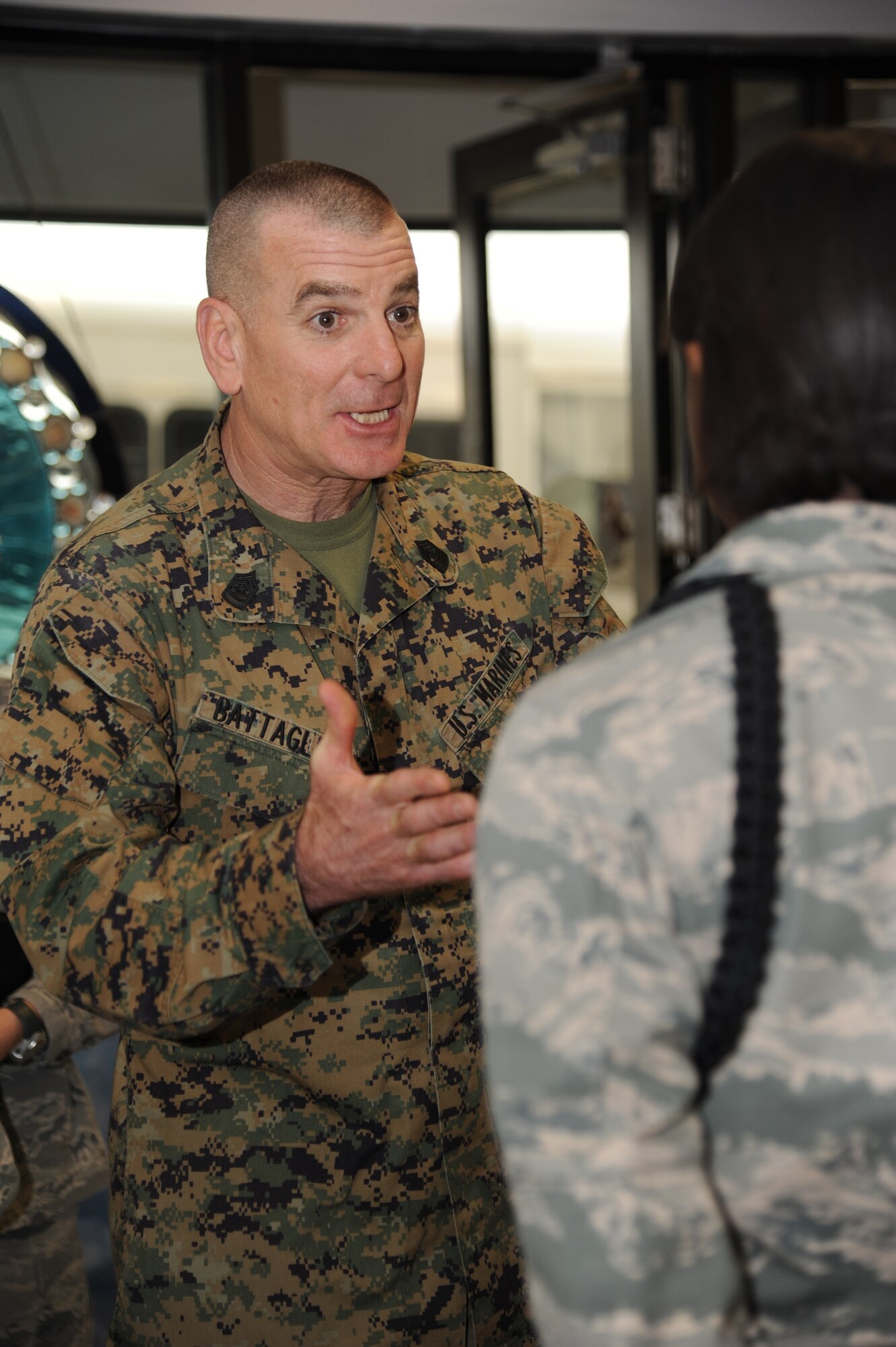 Marine Sgt. Maj. Bryan Battaglia, Senior Enlisted Advisor to the Chairman of the Joint Chiefs of Staff, learns about the 81st Training Group’s leadership rope program and the meaning behind the different colors Jan. 16, 2013, at the Levitow Training Support Facility, Keesler Air Force Base, Miss.  Battaglia’s one-day visit allowed him the opportunity to acquaint himself with Keesler’s people, mission and contribution to the bigger military picture.  He also talked to enlisted Keesler members about the CJCS’ four priorities, his own key themes and his thoughts on bridging the basics and total force fitness.  (U.S. Air Force photo by Kemberly Groue)
