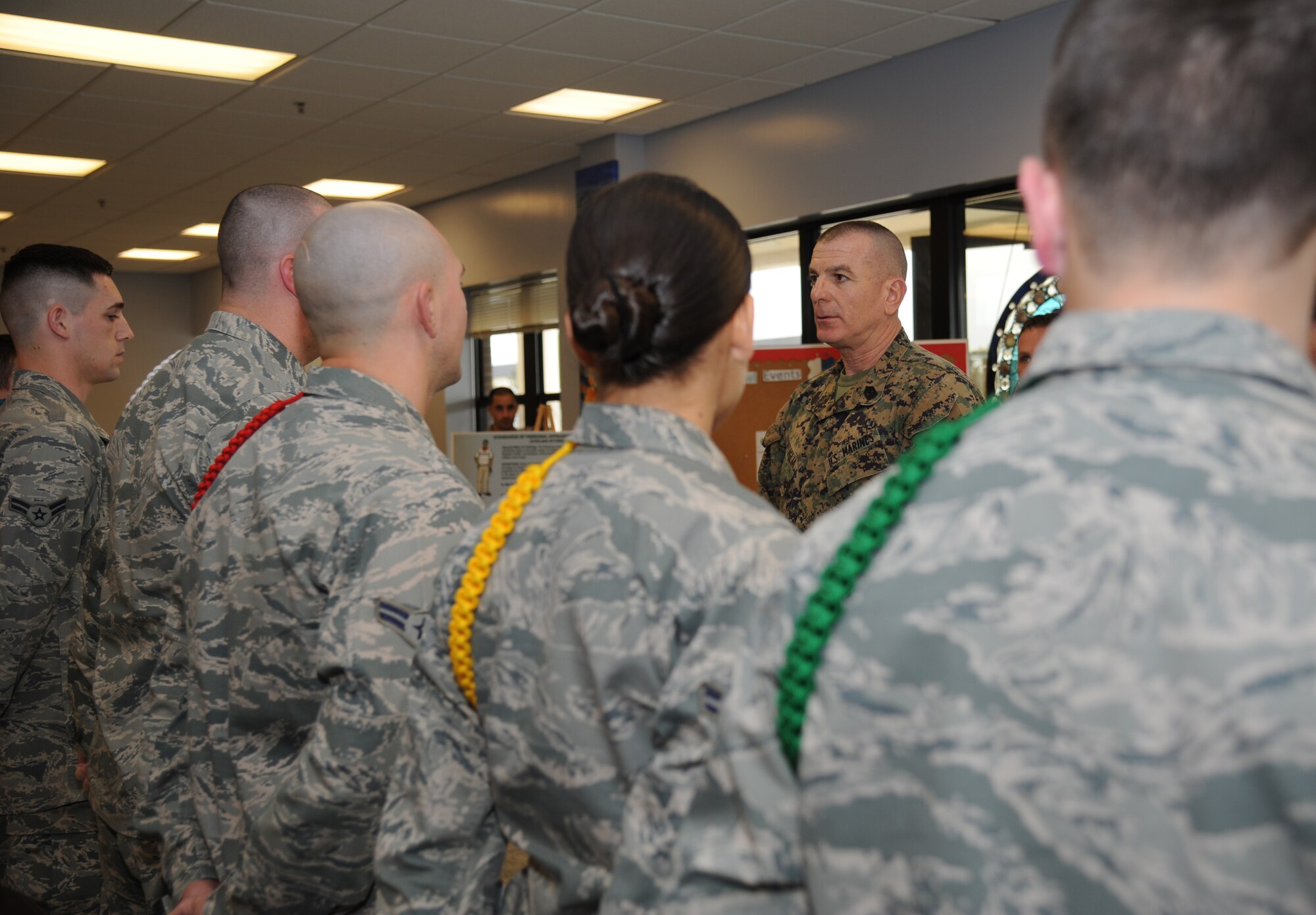 Marine Sgt. Maj. Bryan Battaglia, Senior Enlisted Advisor to the Chairman of the Joint Chiefs of Staff, learns about the 81st Training Group’s leadership rope program and the meaning behind the different colors Jan. 16, 2013, at the Levitow Training Support Facility, Keesler Air Force Base, Miss.  Battaglia’s one-day visit allowed him the opportunity to acquaint himself with Keesler’s people, mission and contribution to the bigger military picture.  He also talked to enlisted Keesler members about the CJCS’ four priorities, his own key themes and his thoughts on bridging the basics and total force fitness.  (U.S. Air Force photo by Kemberly Groue)