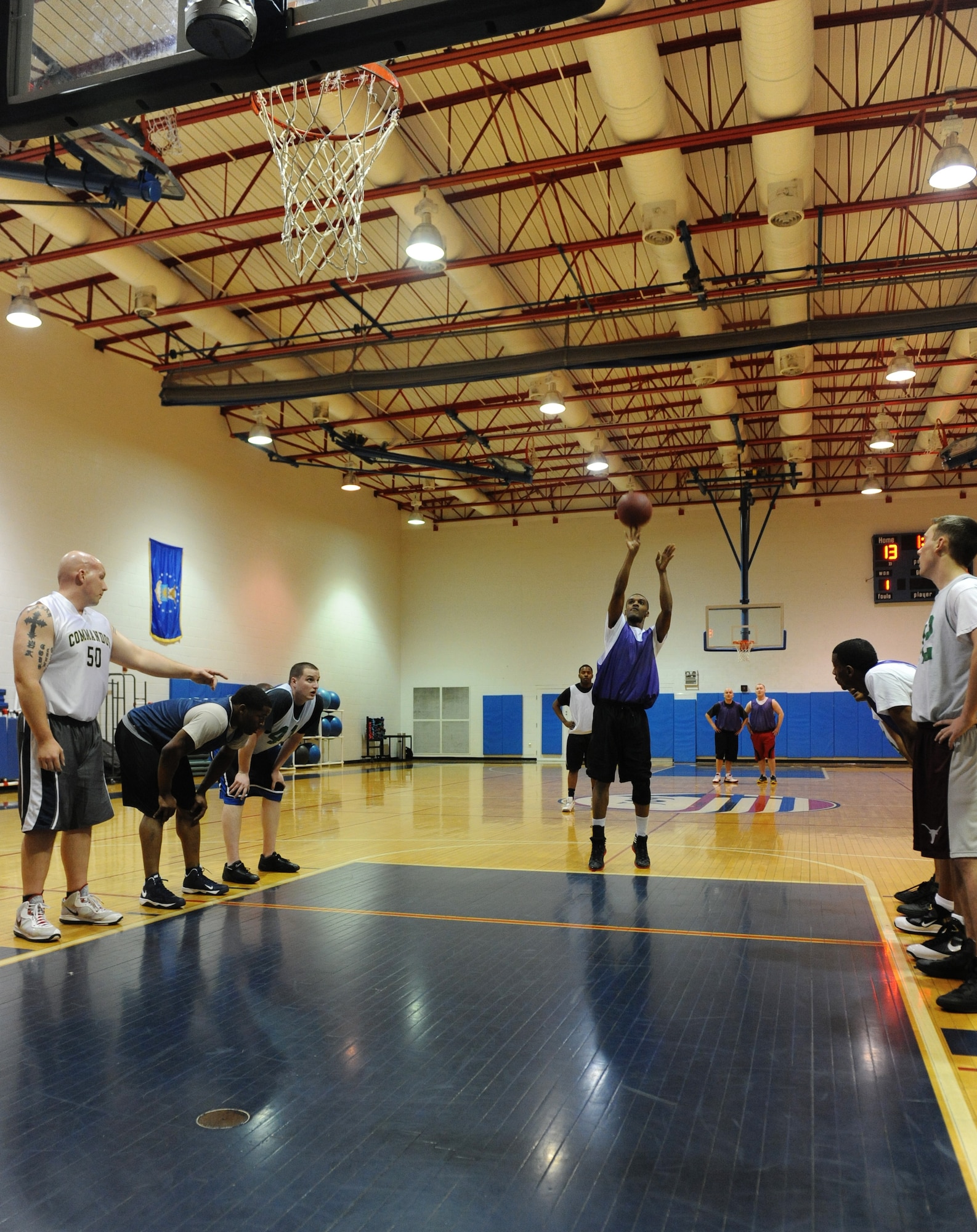 WHITEMAN AIR FORCE BASE, Mo. -- Daniell Branch, 509th Logistics Readiness Squadron intramural basketball team member, shoots a free throw in a game against the 509th Aircraft Maintenance Squadron-B team at the Fitness Center, Jan. 10. LRS cut the deficit to 23-20 by the end of the first half. (U.S. Air Force photo/Airman 1st Class Bryan Crane)(Released)