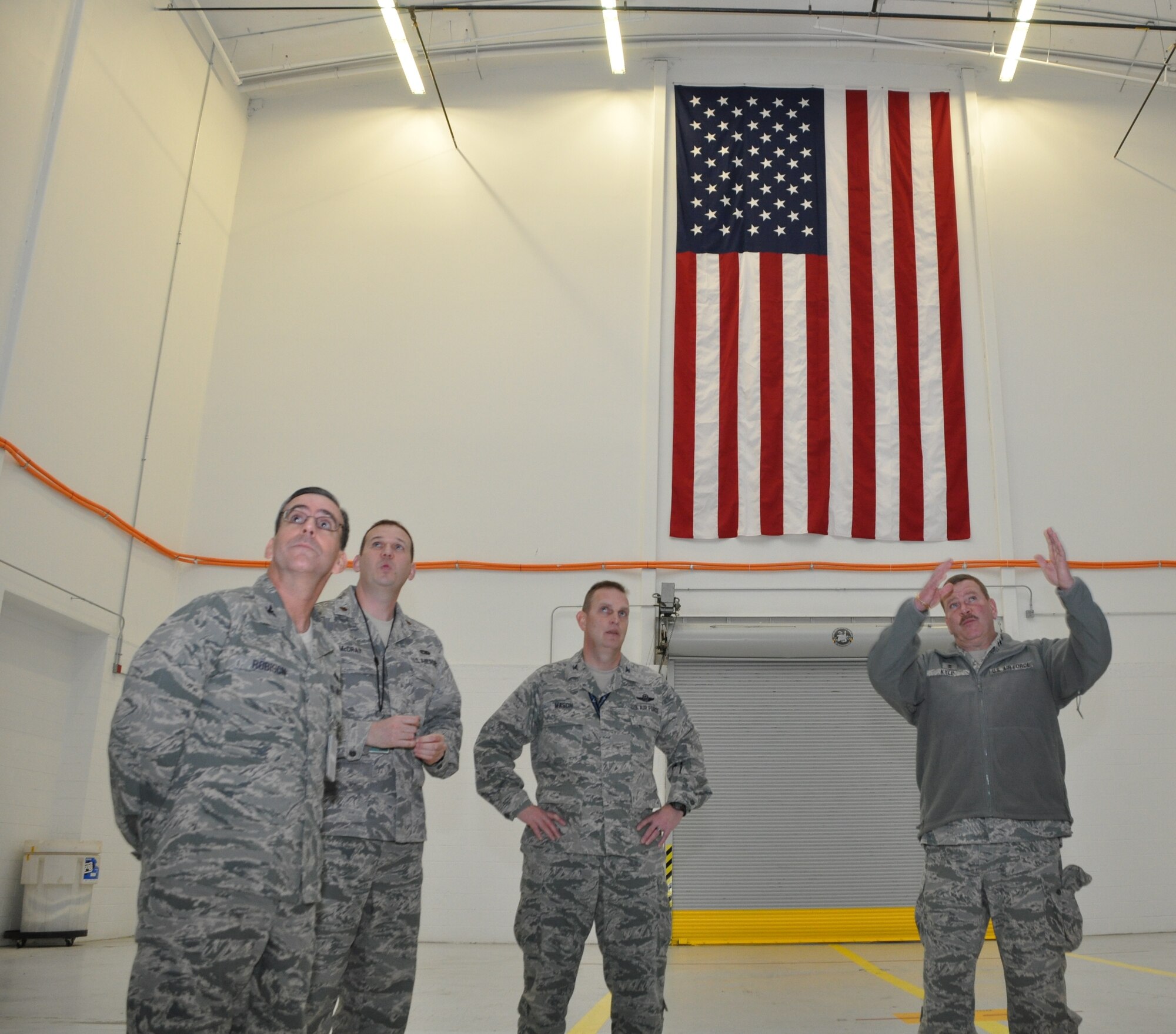 Air Force Maj. Gen. Mark Kyle, commander of Fourth Air Force, suggests ways to enhance hangar capabilities to leadership from the 459th Maintenance Group, and 459th Air Refueling Wing commander, Col. William Mason, at Joint Base Andrews, Md., Jan. 14, 2013. Kyle visited the 459 ARW and met with Mason to discuss effective ways to improve the unit. (U.S. Air Force photo/ Staff Sgt. Katie Spencer)