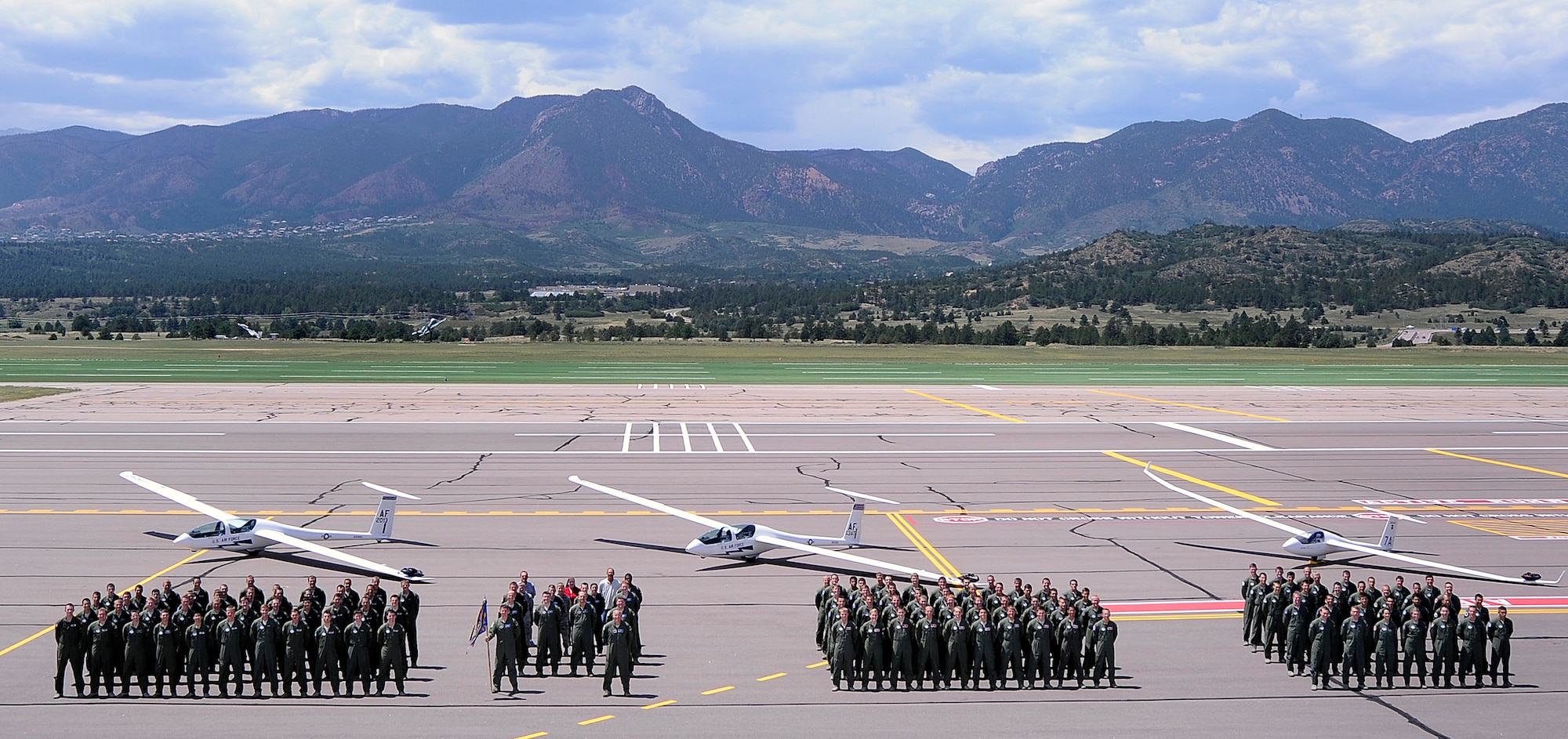 Airmen with the 94th Flying Training Squadron and cadets enrolled in the Air Force Academy's soaring airmanship program pose for a group photo Aug. 6, 2012. The Academy's sailplane racing and aerobatic teams capped their 2012 seasons with several group and individual achievements. (U.S. Air Force photo)