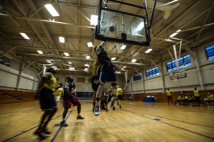 A player from the 628th Security Forces Squadron basketball team drives to the hoop during an intramural basketball game Jan. 15, 2013, at Joint Base Charleston - Air Base. The 2013 Intramural Season tipped off Tuesday with the 628th Logistics Readiness Squadron team beating the 628th SFS team 59 to 49. (U.S. Air Force photo/ Staff Sgt. Rasheen Douglas)
