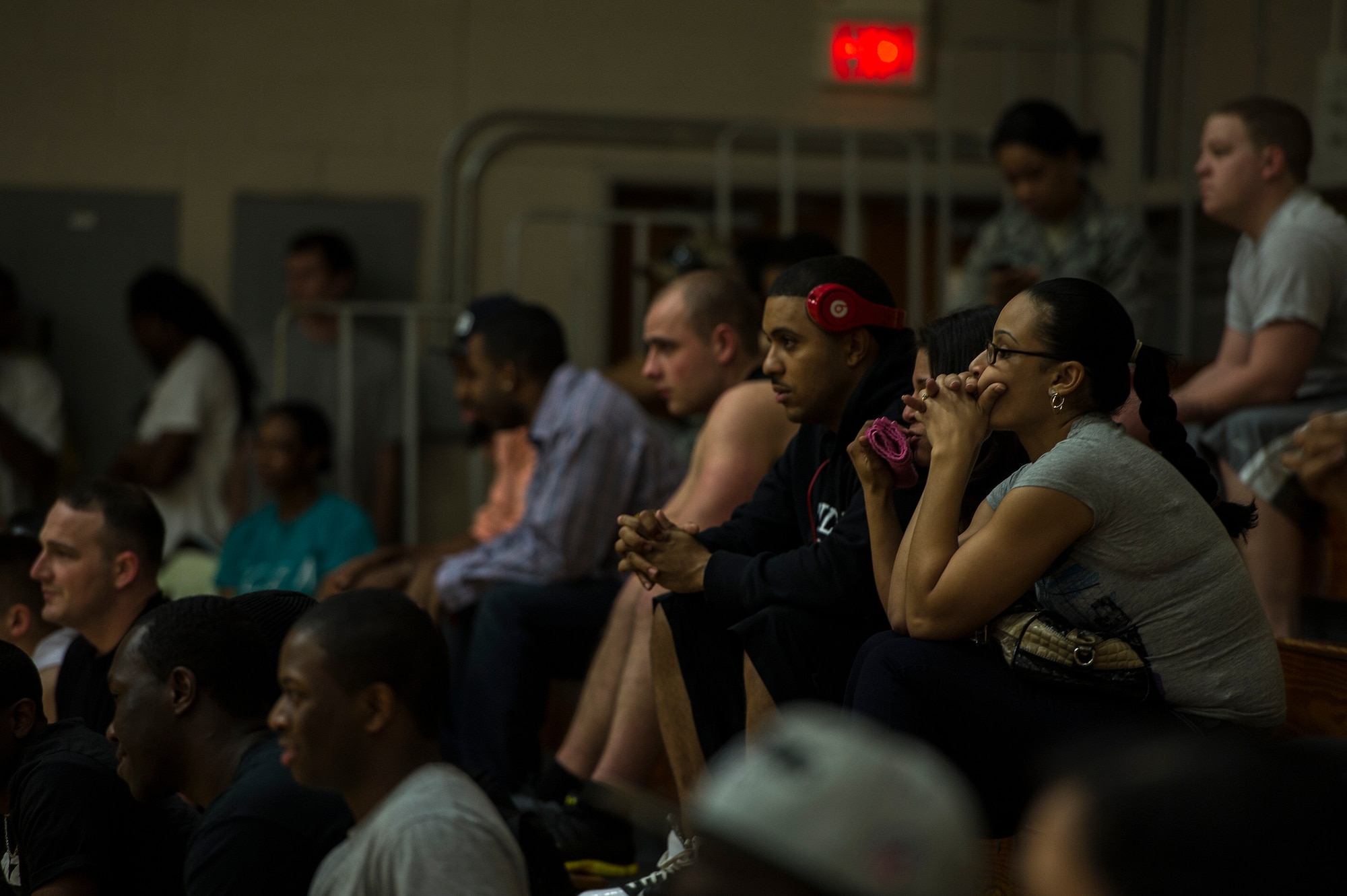 The crowd watches in anticipation as they support the 628th Security Forces Squadron and 628th Logistics Readiness Squadron basketball game Jan. 15, 2013, to kick off the 2013 intramural basketball season at Joint-Base Charleston, S.C.  628th LRS beat the 628th SFS 59 to 49 in the season opener. (U.S. Air Force photo/Staff Sgt. Rasheen Douglas)