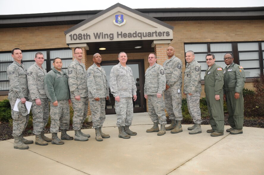 Several Airmen from the 108th Wing reenlist Jan. 12, 2013 at the Wing's January Unit Training Assembly. From left to right, Senior Airman David M. Savino, Staff Sgt. William S. Fielding, Tech. Sgts. Sean M. Nitahara, Anthony P. Rodig, Terence A. Roundtree, Col. Robert Meyer, who administered the Oath of Enlistment, Master Sgts. Michael Elbertson, Eric P. Hunt, Francisco J. Vega, Jose Rodriguez, and Chief Master Sgt. Marvin C. Nichols. (Air National Guard photo by Staff Sgt. Armando Vasquez/Released)