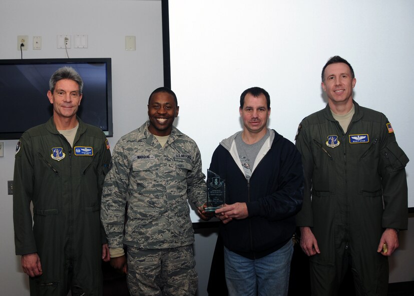 Master Sgts. Troy Marquis and David Snody, members of the 108th Wing Civil Engineer Squadron Base Recovery Team, accept the Fiscal Year 2013 1st Quarter Safety Award at Joint Base McGuire-Dix-Lakehurst, Jan. 10, 2013. The award was presented to Marquis and Snody by Col. Kevin Keehn, 108th Wing commander, and Lt. Col. Martin Ryan, 108th Wing Chief of Safety. (Air National Guard photo by Airman 1st Class Kellyann Novak/Released)