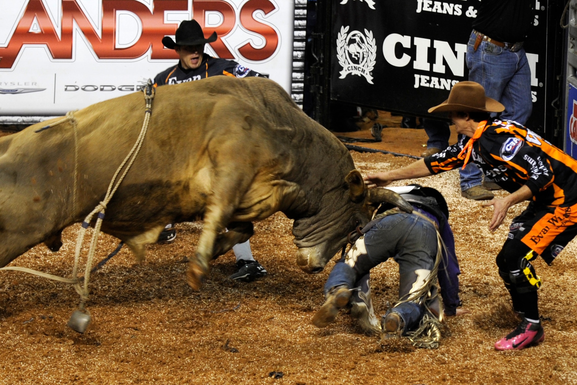 Steve Woosley, Payson, Utah, scrambles for safety during the Tuff Hedeman Louisiana Shootout at the Centurylink Center in Bossier City, La., Jan. 12, 2013. Cody Teel, of Kountze, Texas, finally won the event with a score of 90, winning a $14,000 prize. The Centurylink Center hosts numerous entertainment and sporting events throughout the year with some offering discounts to military personnel. For a young Barksdale Airman who can’t afford a car payment, a round-trip cab ride to the Centurylink Center is approximately 20 dollars for a safe and exciting night off base. It was listed as one of the Top 100 Venues for Worldwide Ticket Sales for Mid-Year 2012 by Pollstar Magazine. It was ranked 67th in the world and 34th in the United States. (U.S. Air Force photo by Master Sgt. Jeff Walston)
