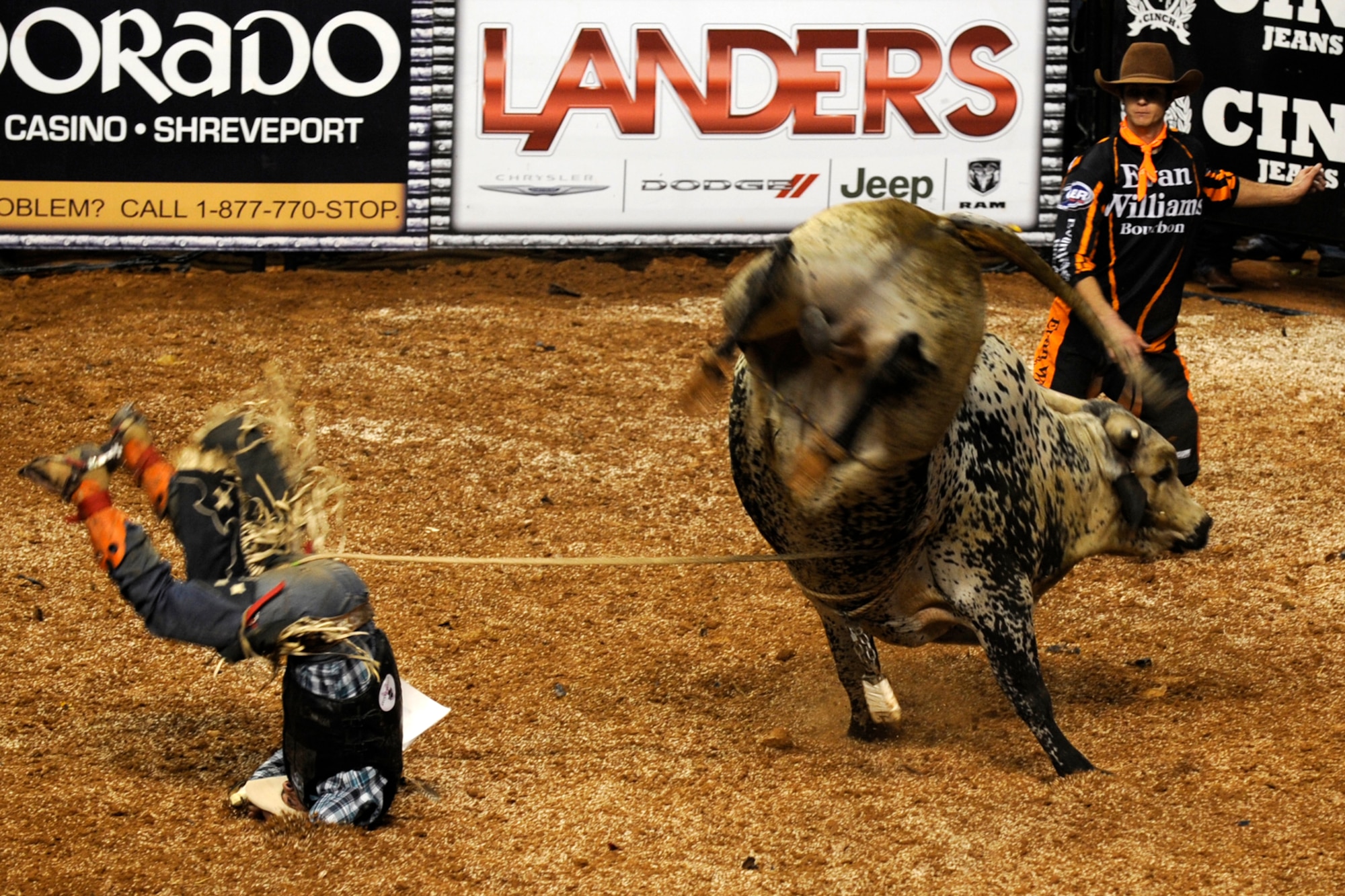 Hector Cardona, who hails from Saltillo, Mexico, takes a tumble during the Tuff Hedeman Louisiana Shootout at the Centurylink Center in Bossier City, La., Jan. 12, 2013. Cody Teel, of Kountze, Texas, finally won the event with a score of 90, winning a $14,000 prize. The Centurylink Center hosts numerous entertainment and sporting events throughout the year with some offering discounts to military personnel. For a young Barksdale Airman who can’t afford a car payment, a round-trip cab ride to the Centurylink Center is approximately 20 dollars for a safe and exciting night off base. It was listed as one of the Top 100 Venues for Worldwide Ticket Sales for Mid-Year 2012 by Pollstar Magazine. It was ranked 67th in the world and 34th in the United States. (U.S. Air Force photo by Master Sgt. Jeff Walston)