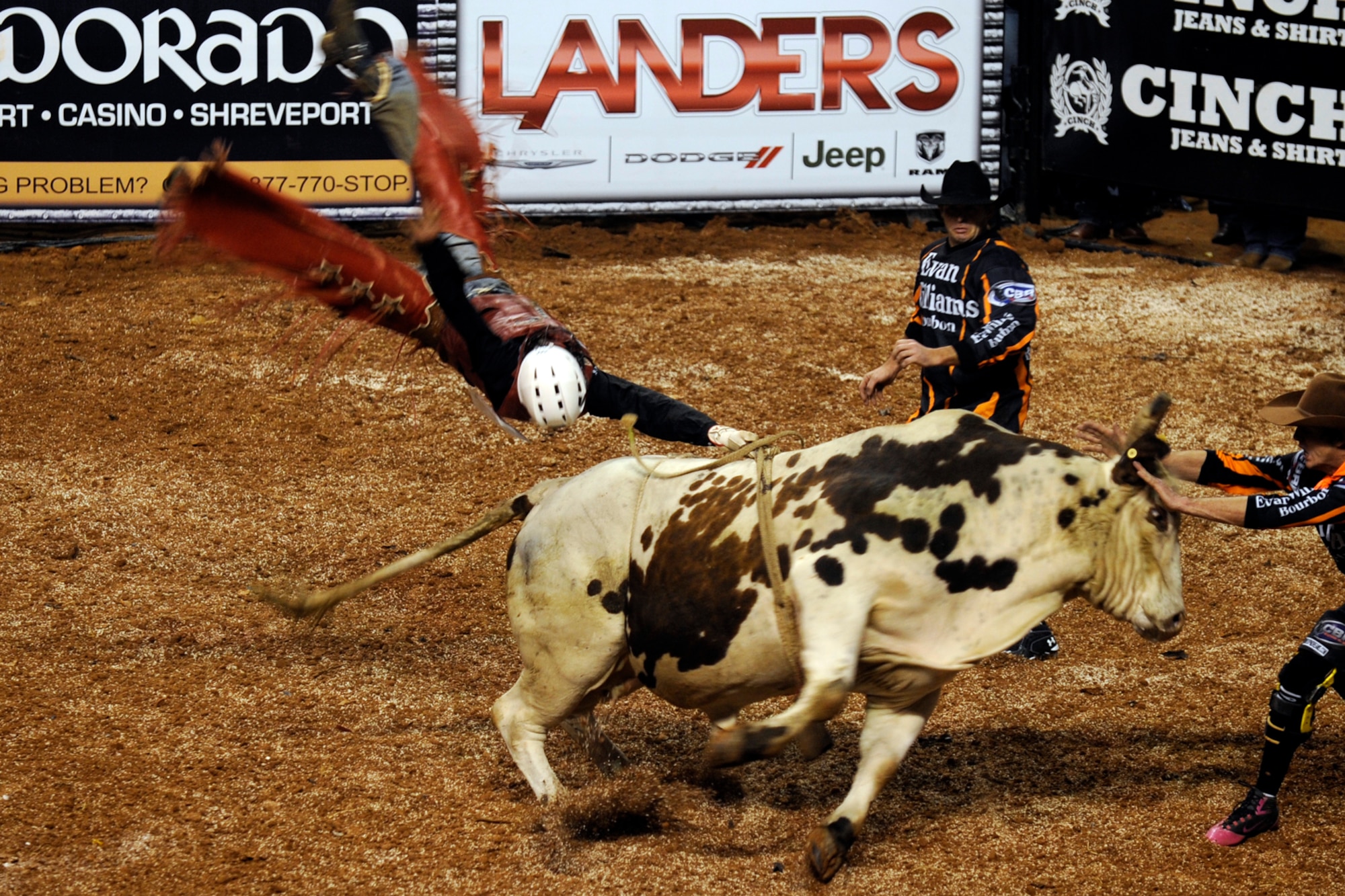 Tate Harris, of Palestine, Texas, finds it difficult to keep up with his ride during the Tuff Hedeman Louisiana Shootout at the Centurylink Center in Bossier City, La., Jan. 12, 2013. In the end, Cody Teel, from Kountze, Texas, won the bull riding event with a score of 90, taking home $14,000 in prize money. The Centurylink Center hosts numerous entertainment and sporting events throughout the year with some offering discounts to military personnel. For a young Barksdale Airman who can’t afford a car payment, a round-trip cab ride to the Centurylink Center is approximately 20 dollars for a safe and exciting night off base. It was listed as one of the Top 100 Venues for Worldwide Ticket Sales for Mid-Year 2012 by Pollstar Magazine. It was ranked 67th in the world and 34th in the United States. (U.S. Air Force photo by Master Sgt. Jeff Walston)