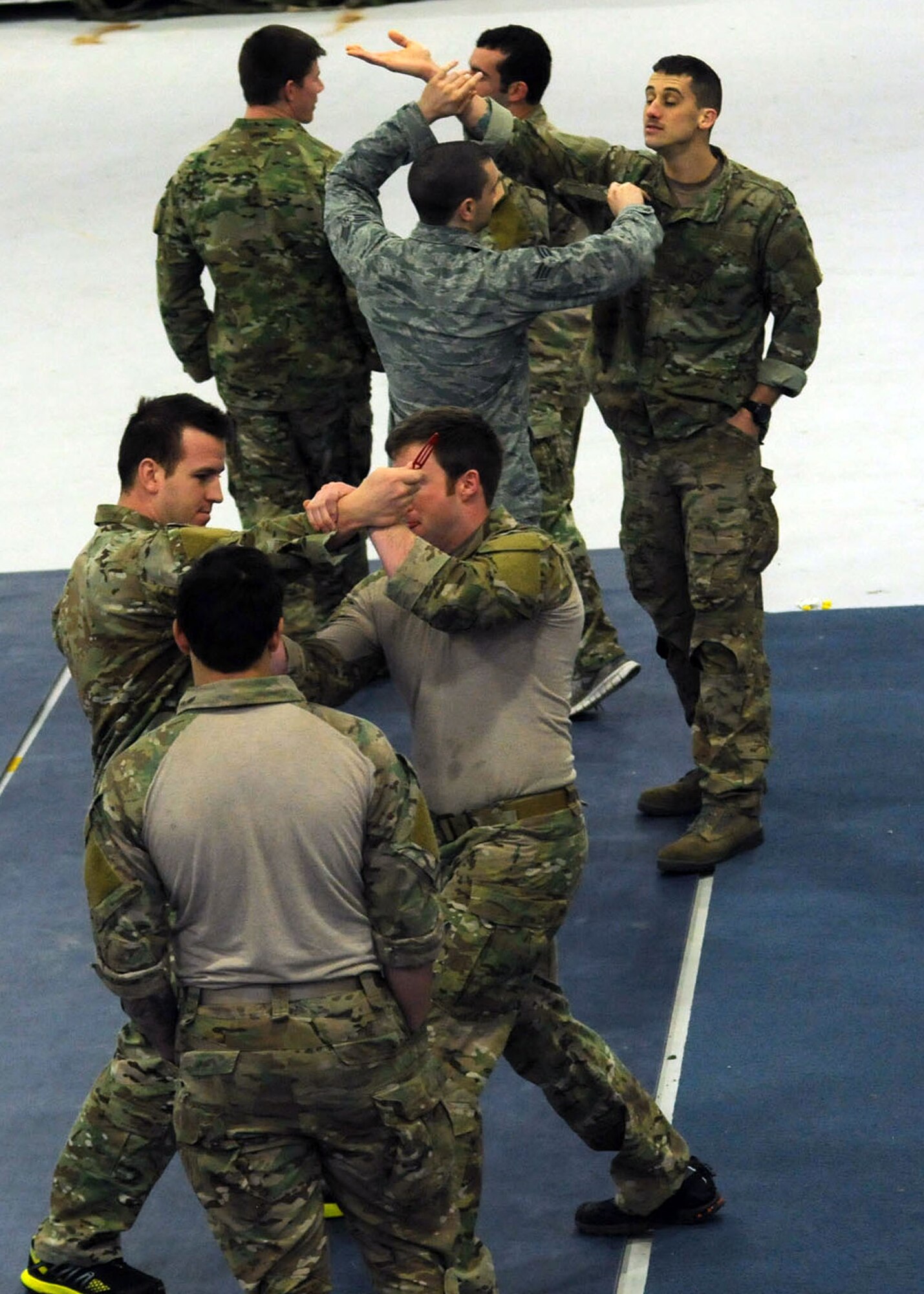 Airmen from the 321st Special Tactics Squadron train in knife skills Jan. 11, 2013, in building 539 at RAF Mildenhall, England. The Airmen train regularly to keep their skills sharp. (U.S. Air Force photo by Airman 1st Class Kelsey Waters/Released)