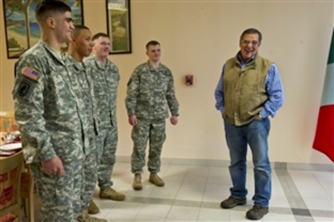U.S. Defense Secretary Leon E. Panetta visits with troops after lunch in Vicenza, Italy, Jan. 17, 2013. Panetta is on a six-day trip to Europe to visit with defense counterparts and troops.
