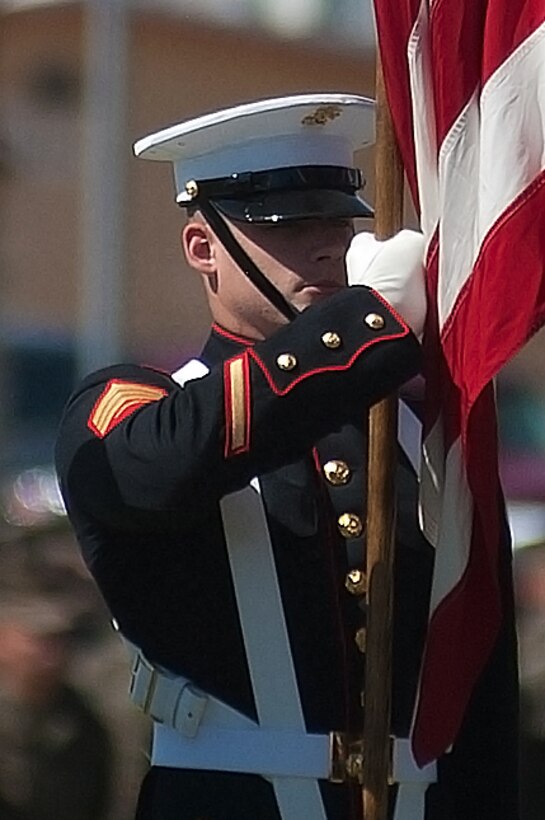 Sgt. Timothy A. Spreder, color sergeant of the Marine Corps, holds the national ensign during a Battle Color Detachment Ceremony at Marine Corps Air Ground Combat Center, Twentynine Palms, Calif., March 6, 2012.
