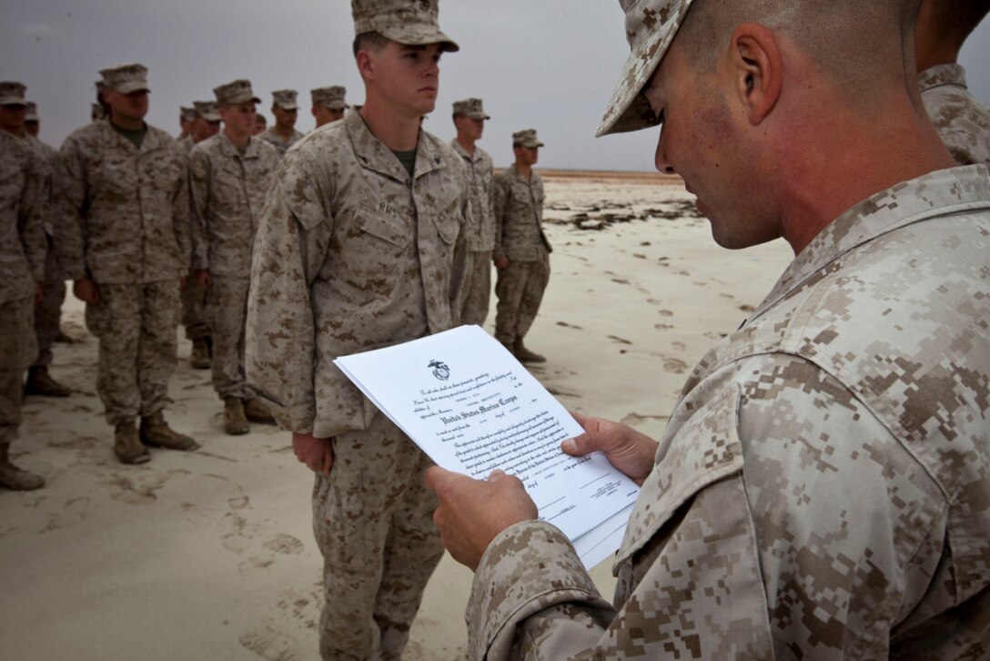 Lance Cpl. Raymond J. Riis, Lima Company, Battalion Landing Team 3/5, 15th Marine Expeditionary Unit, stands in formation before receiving his new rank of corporal in the U.S. 5th Fleet area of responsibility, Dec. 14, 2012. The 15th MEU is deployed as part of the Peleliu Amphibious Ready Group as a U.S. Central Command theater reserve force, providing support for maritime security operations and theater security cooperation efforts in the U.S. 5th Fleet area of responsibility. (U.S. Marine Corps photo by Cpl. Bobby J. Gonzalez)