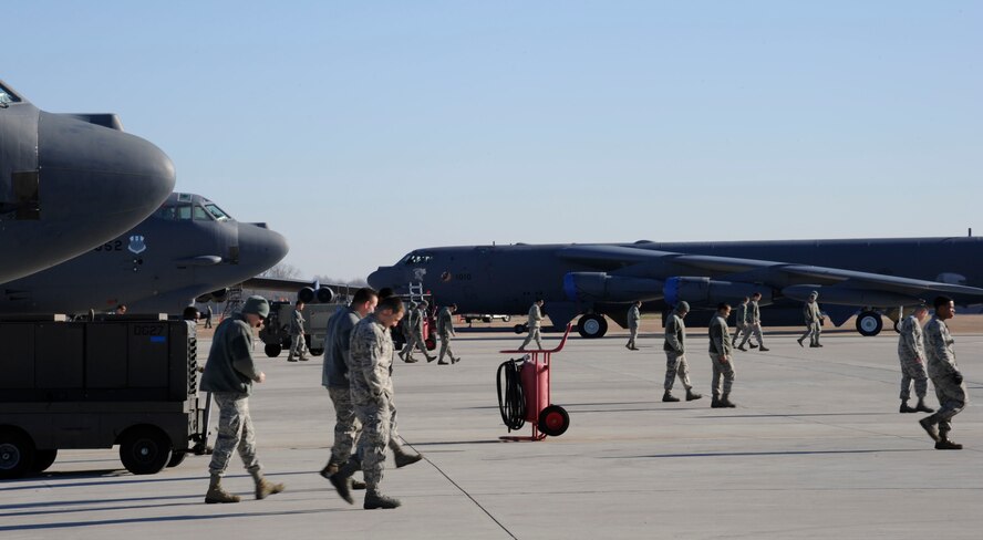 Airmen assigned to the 20th Aircraft Maintenance Squadron, conduct a FOD walk on the flightline at Barksdale Air Force Base, La., Jan. 18. Members of the 20th AMU consist of multiple Air Force Specialty Codes such as hydraulics technicians, engine specialists and crew chiefs who all provide flightline maintenance to B-52s. (U.S. Air Force photo/Airman 1st Class Andrew Moua)