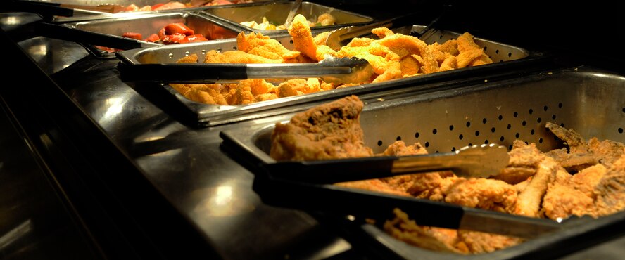 Various food items sit on the buffet line at the Barksdale Club on Barksdale Air Force Base, La., Jan. 17.  The Barksdale Club recently underwent renovations which rearranged the seating and set up of the club's dining areas. The many choices the club has to offer are available during the lunch between 11 a.m. and 1 p.m. (U.S. Air Force photo/Airman 1st Class Andrew Moua)