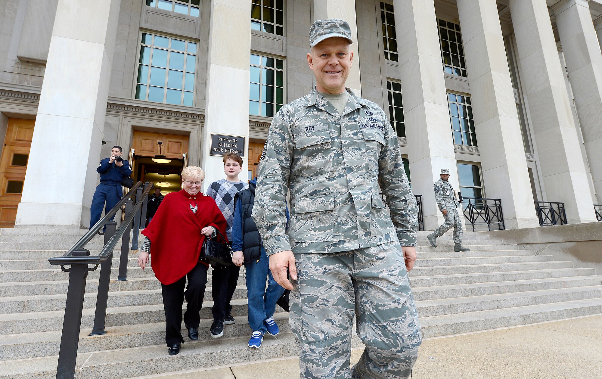 Chief Master Sgt. of the Air Force James Roy and his family depart the Pentagon, Jan. 17. 2013, on Roy's last day in the office prior to his retirement and transition ceremony on Jan. 24. Roy is the 16th chief master sergeant of the Air Force. (U.S. Air Force photo/Jim Varhegyi)