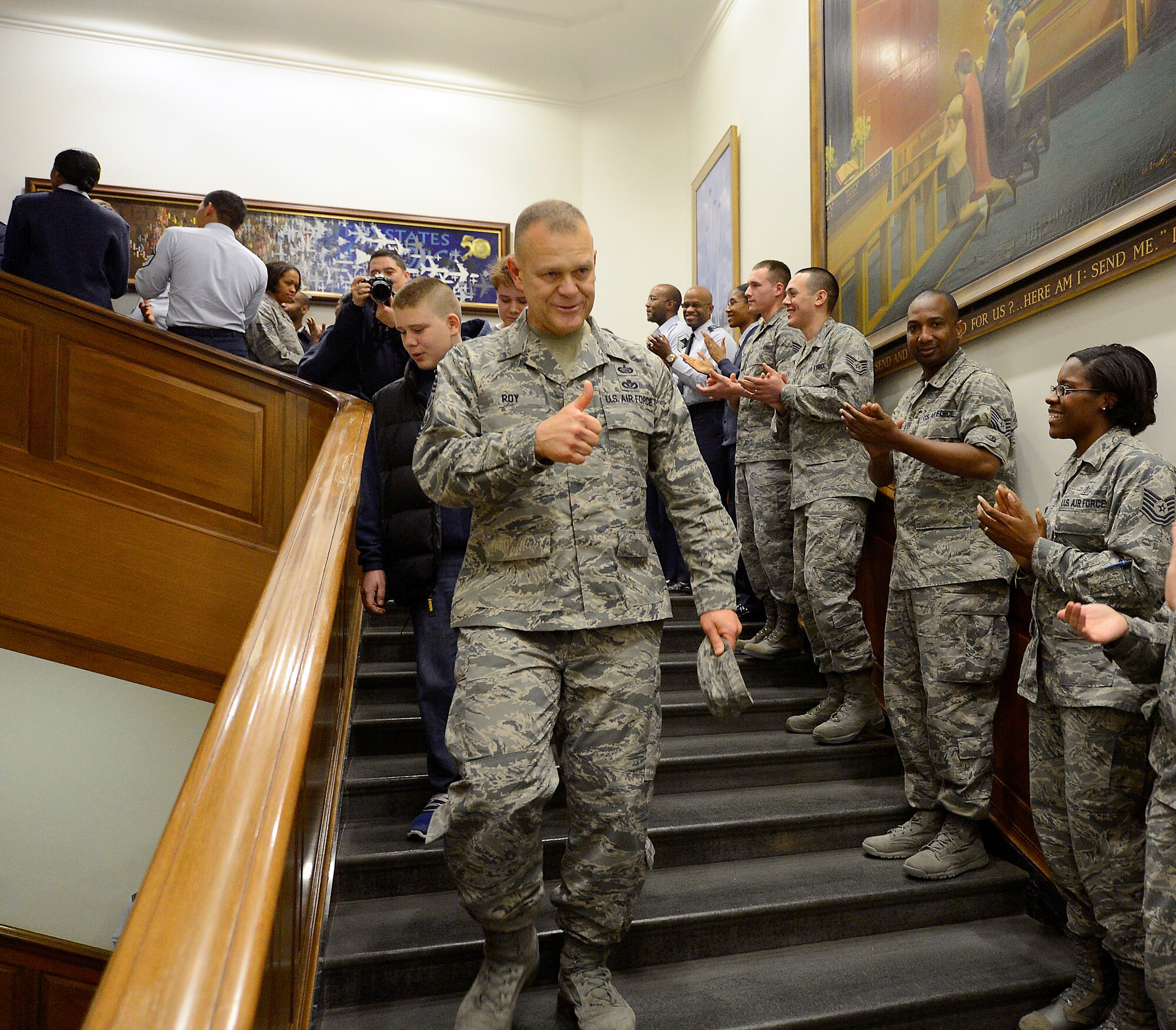 Chief Master Sgt. of the Air Force James Roy and his family depart the Pentagon, Jan. 17. 2013, on Roy's last day in the office prior to his retirement and transition ceremony on Jan. 24. Roy is the 16th chief master sergeant of the Air Force. (U.S. Air Force photo/Jim Varhegyi)