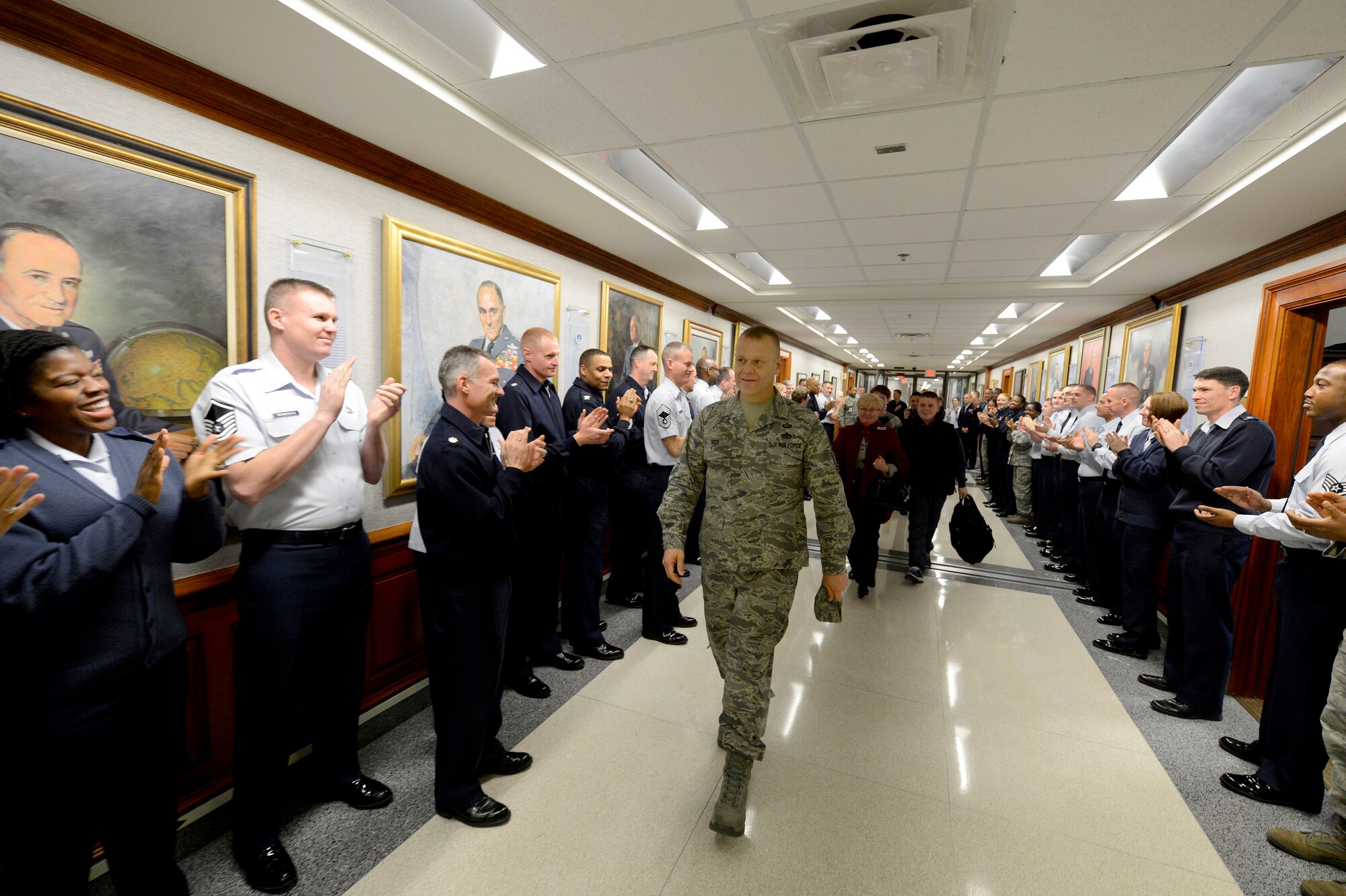 Chief Master Sgt. of the Air Force James Roy and his family depart the Pentagon, Jan. 17. 2013, on Roy's last day in the office prior to his retirement and transition ceremony on Jan. 24. Roy is the 16th chief master sergeant of the Air Force. (U.S. Air Force photo/Jim Varhegyi)