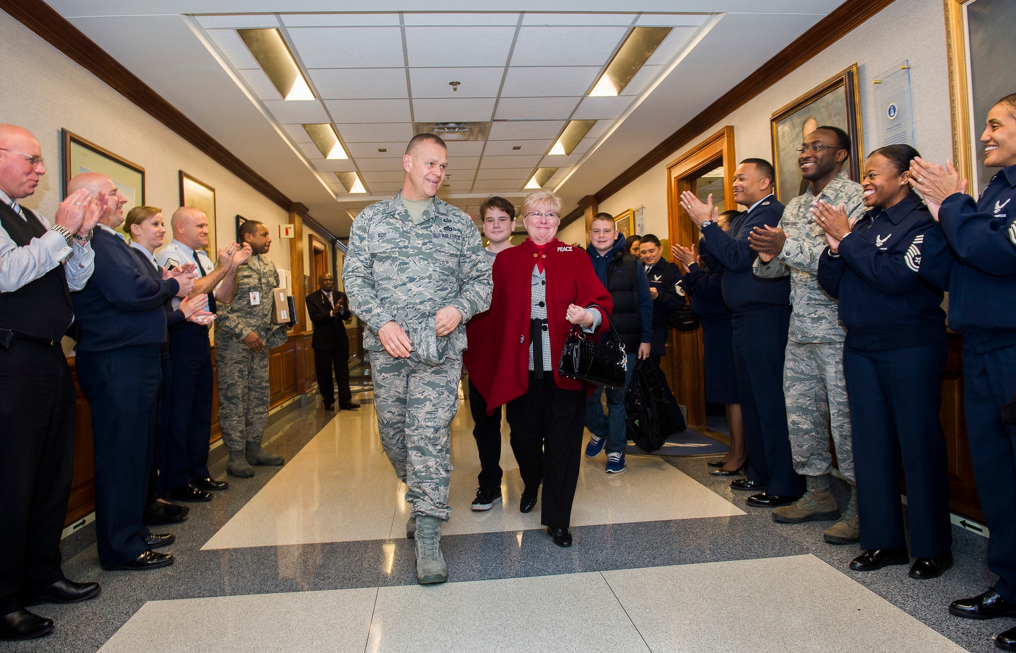 Chief Master Sgt. of the Air Force James Roy and his family depart the Pentagon, Jan. 17. 2013, on Roy's last day in the office prior to his retirement and transition ceremony on Jan. 24. Roy is the 16th chief master sergeant of the Air Force. (U.S. Air Force photo/Jim Varhegyi)