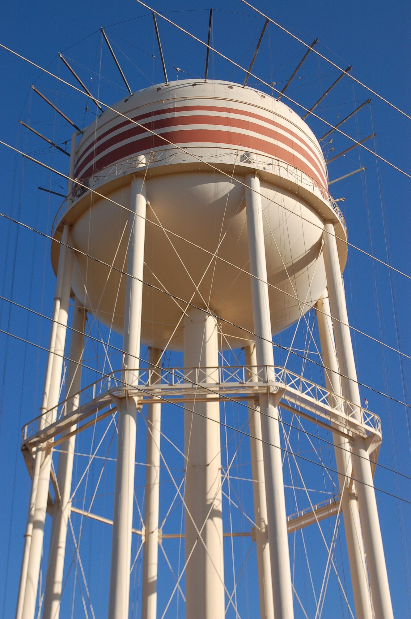 A $1.26 million repair project to repaint and repair the elevated water storage tank here is scheduled to be completed Feb. 5, 2013. Repairs consist of fixing external corrosion of the protective surfaces and replacing select controls, valves and critical components. (Courtesy photo)
