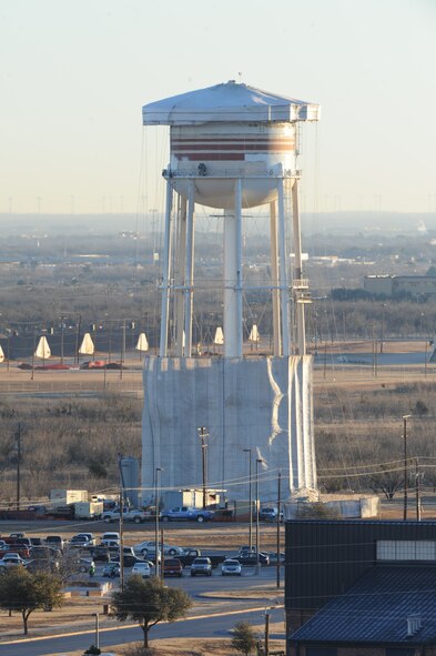 A $1.26 million repair project to repaint and repair the elevated water storage tank here is scheduled to be completed Feb. 5, 2013. Repairs consist of fixing external corrosion of the protective surfaces and replacing select controls, valves and critical components. (Courtesy photo)