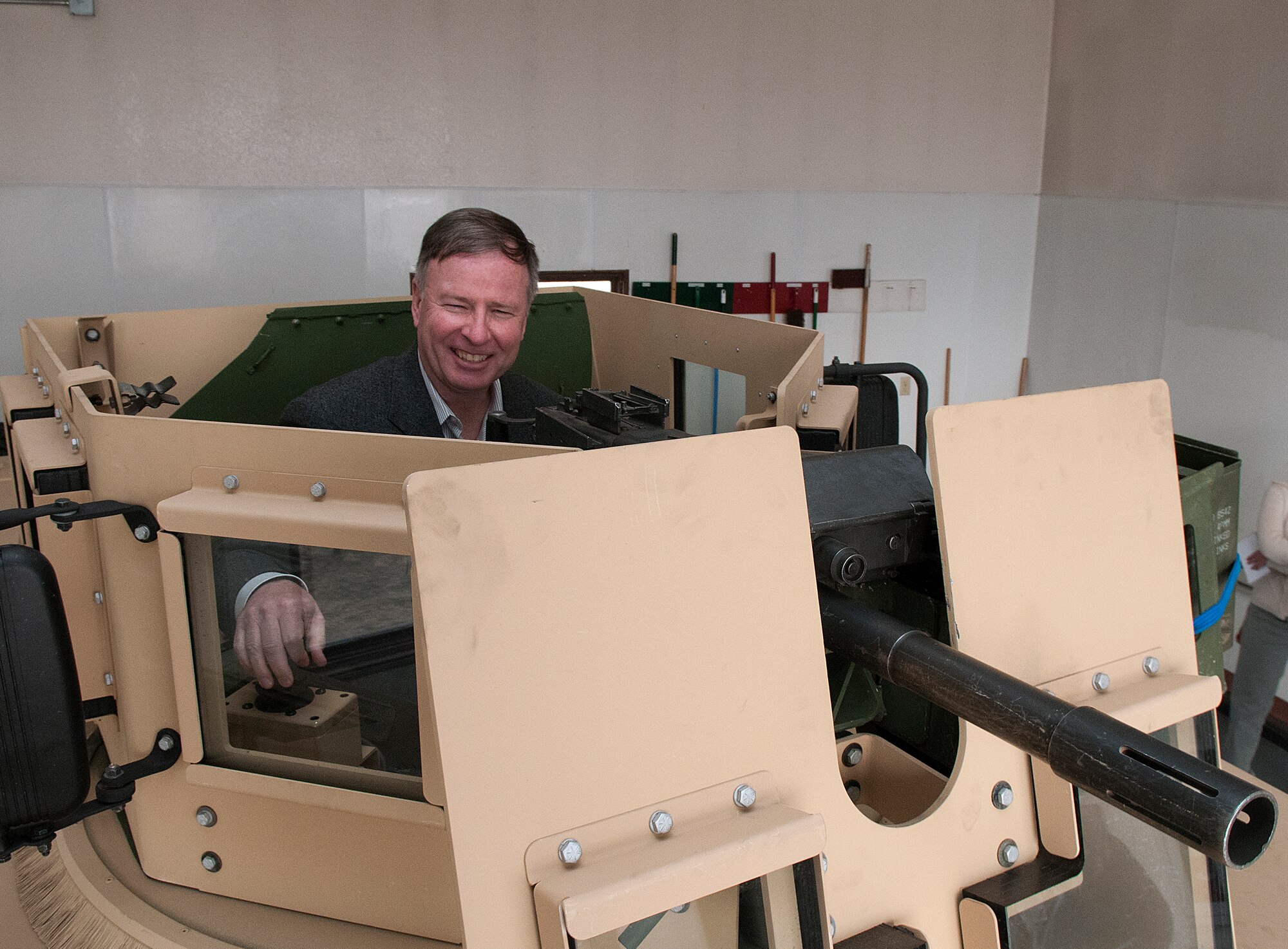 Congressman Douglas Lamborn, Colorado’s Fifth District representative, tries out the gunner’s turret on an armored Humvee with a Mark-19 automatic grenade launcher during a tour of Missile Alert Facility Lima-01 in Weld County, Colo., Jan. 10. Lamborn, a member of the Strategic Forces Subcommittee of the House Armed Forces Committee, visited the 90th Missile Wing to learn more about its deterrence mission. (U.S. Air Force photo by R.J. Oriez)