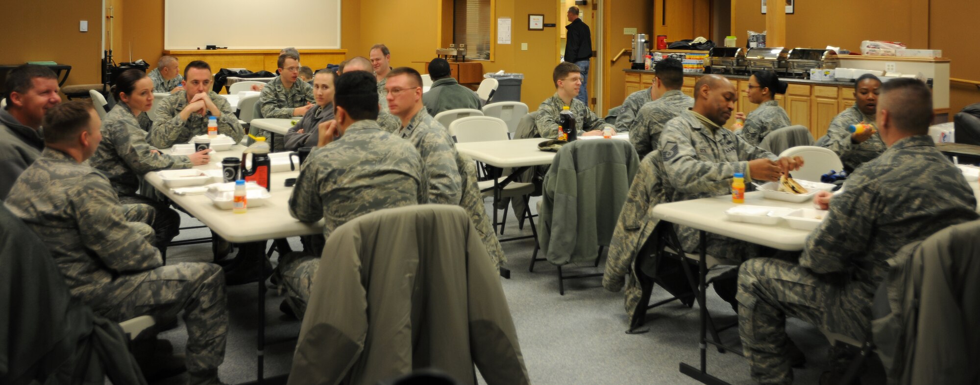 Airmen from the 319th Air Base Wing enjoy an all-you-can-eat pancake breakfast Jan. 11, 2013, at Sven's Den on Grand Forks Air Force Base, N.D. The breakfast was organized and provided by the 319th ABW First Sergeants Council as a fundraiser for future wing events. (U.S. Air Force photo/Airman 1st Class Xavier Navarro)